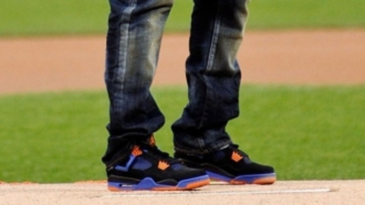 SoleWatch: 50 Cent Throws the Heat in 'Cavs' Air Jordan 4