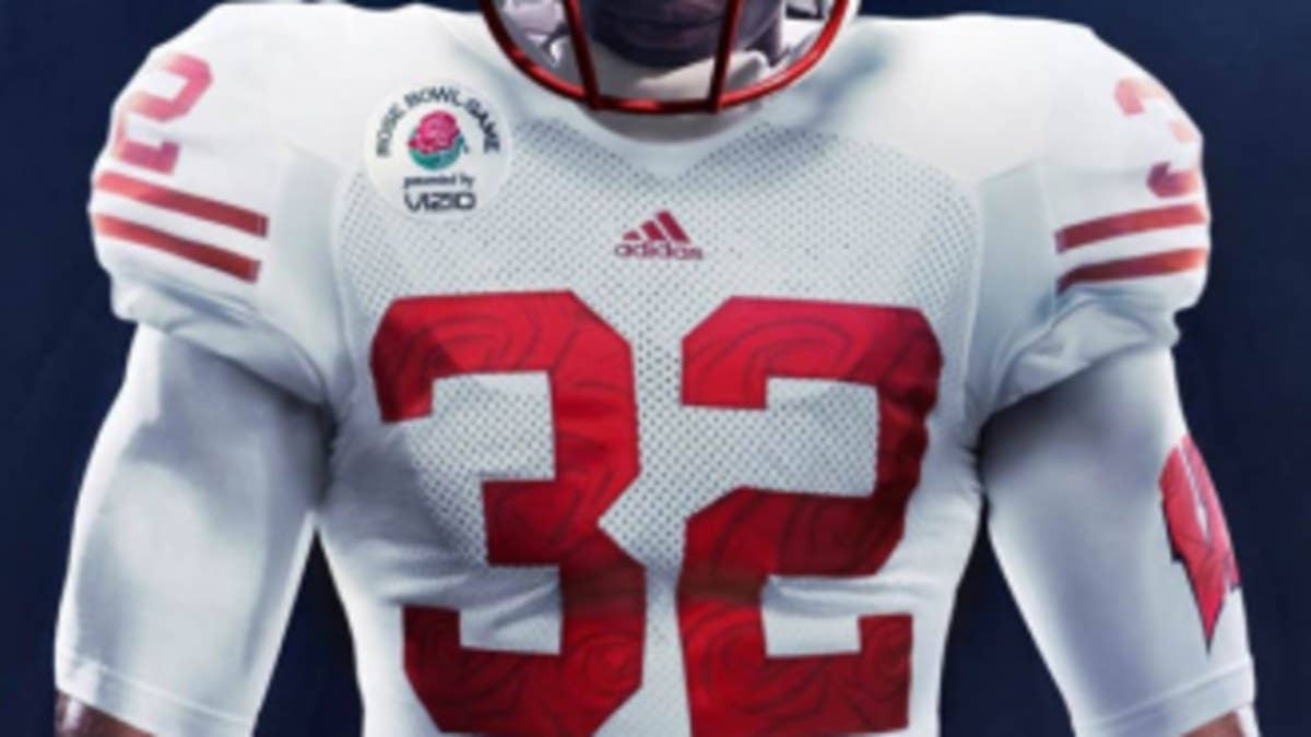 The white and red uniform features a unique "Battle Rose" design, which includes rose petal graphics within the jersey numbers.