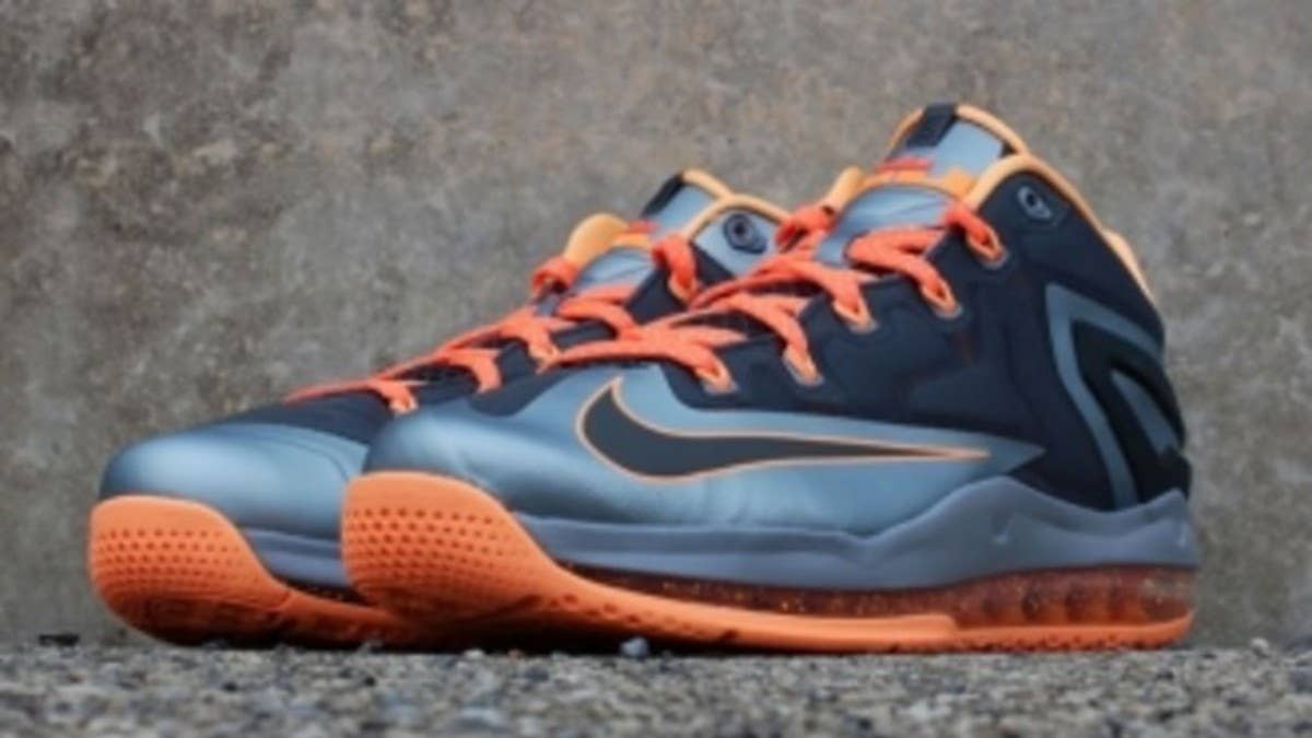 A continuation of a concept introduced last season, the Nike LeBron 11 Low surfaces in a new 'Lava' colorway.