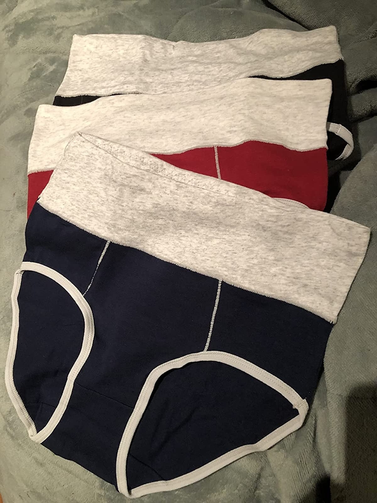 reviewer image of three pairs of the full coverage underwear