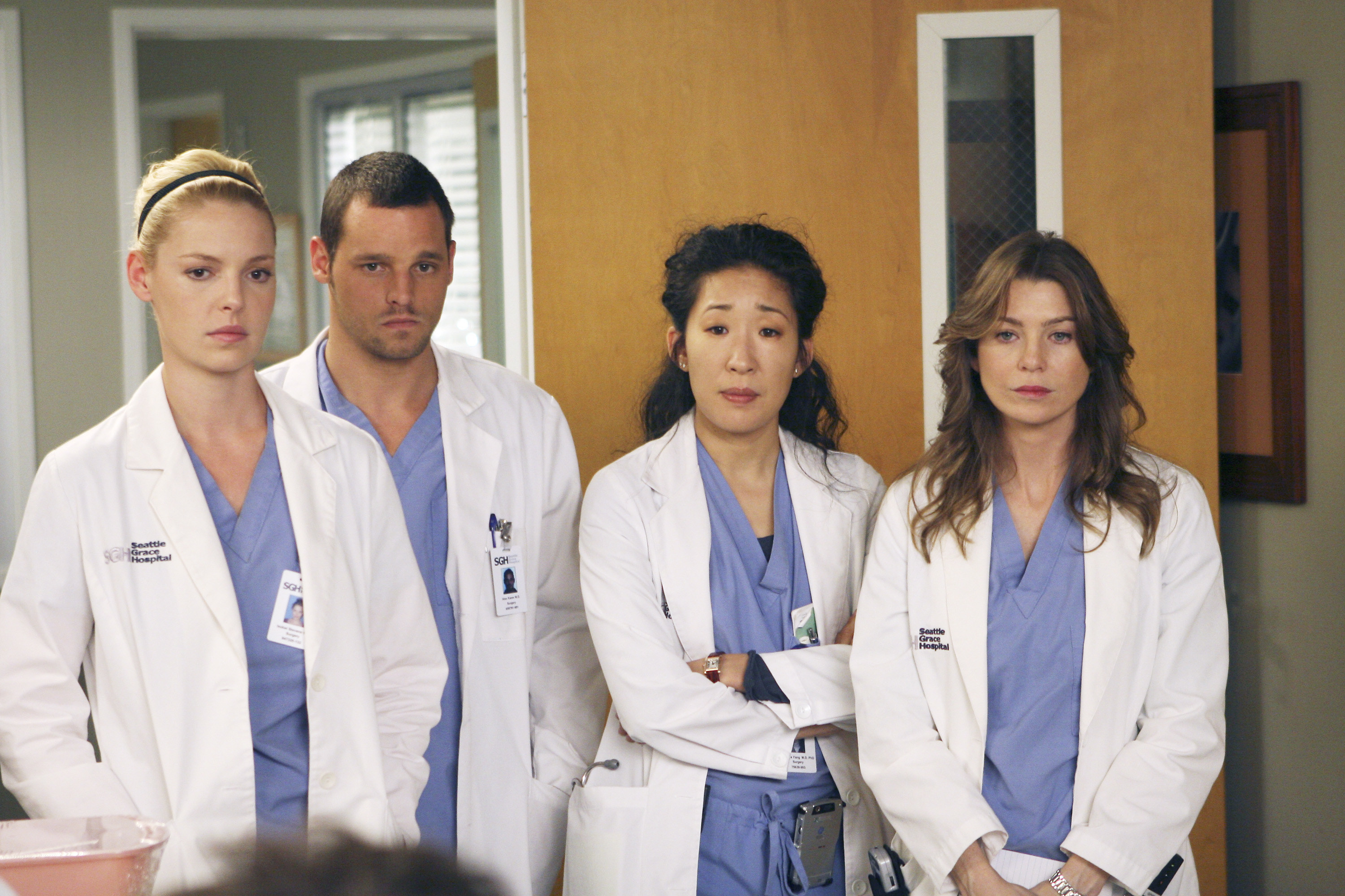 From left to right: Izzie, Alex Karev, Christina Yang, and Meredith