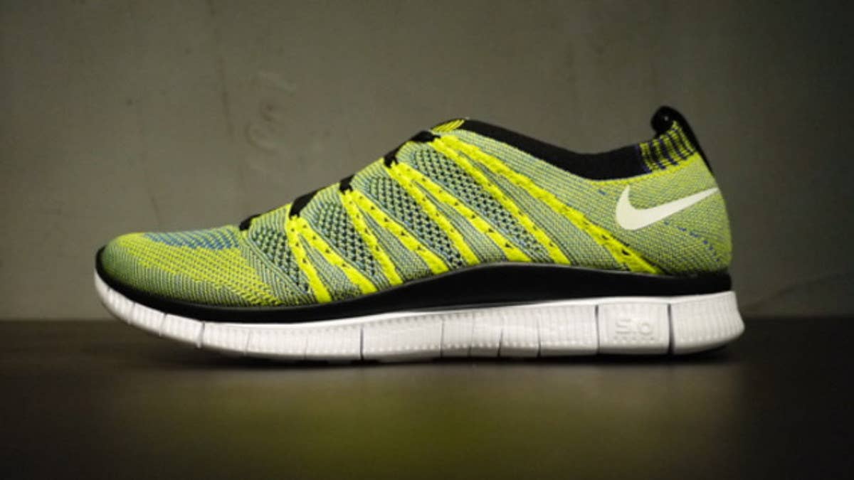 Nike's newest HTM collection continues with the Free Flyknit HTM SP in Volt / Varsity Royal / Black.