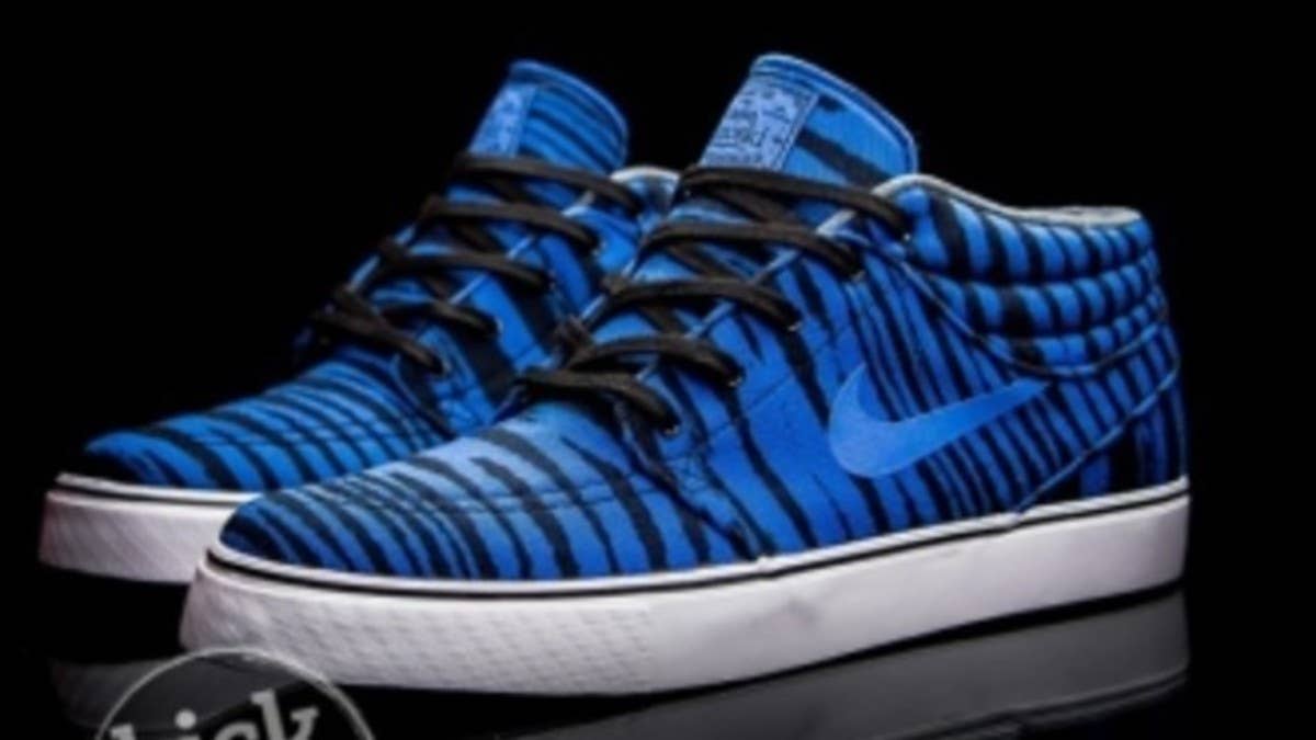An energetic tiger print is brought to life over this all new SB Stefan Janoski Mid by Nike Skateboarding.