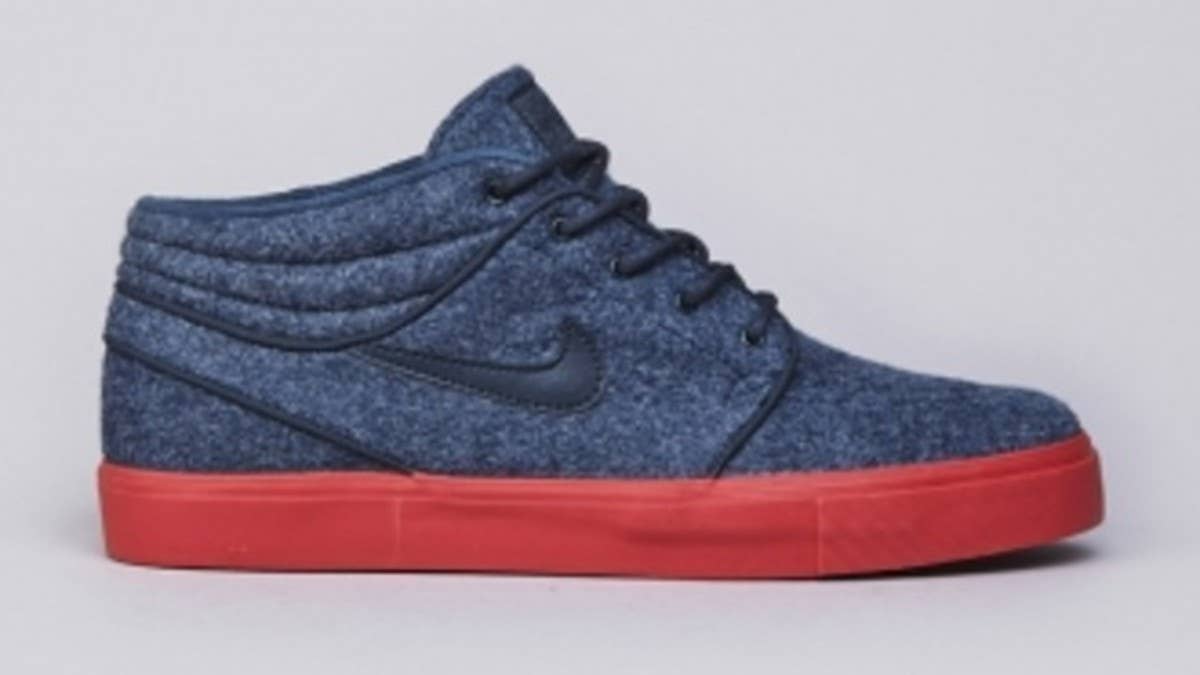 We're hit with yet another clean look for the SB Stefan Janoski this month, arriving in a non-traditional mid-cut form.