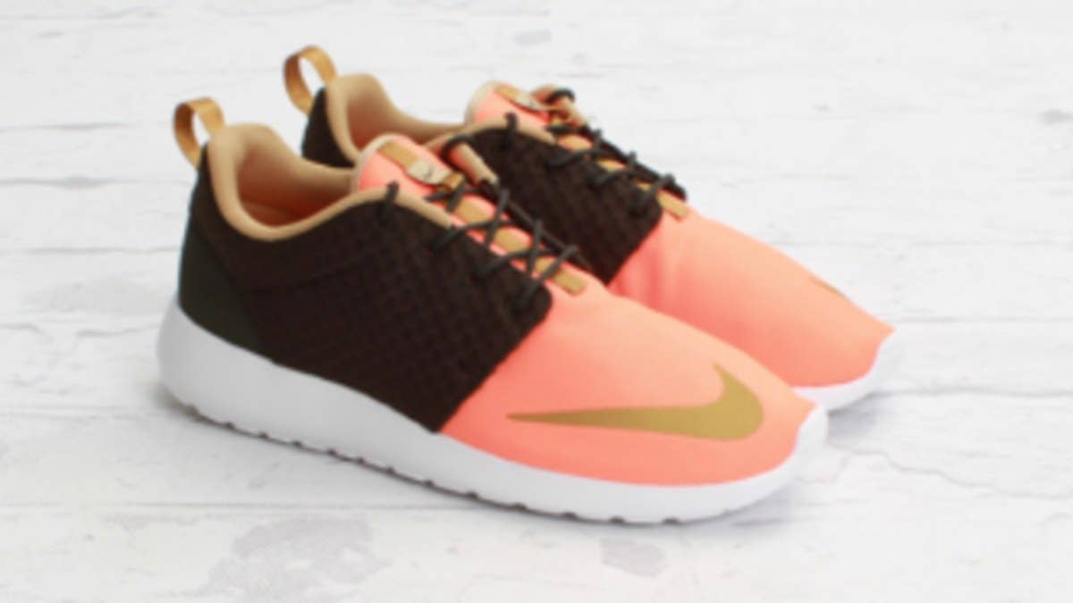 The rise of the Roshe Run FB continues this week with the release of a new Total Orange / Metallic Gold colorway.