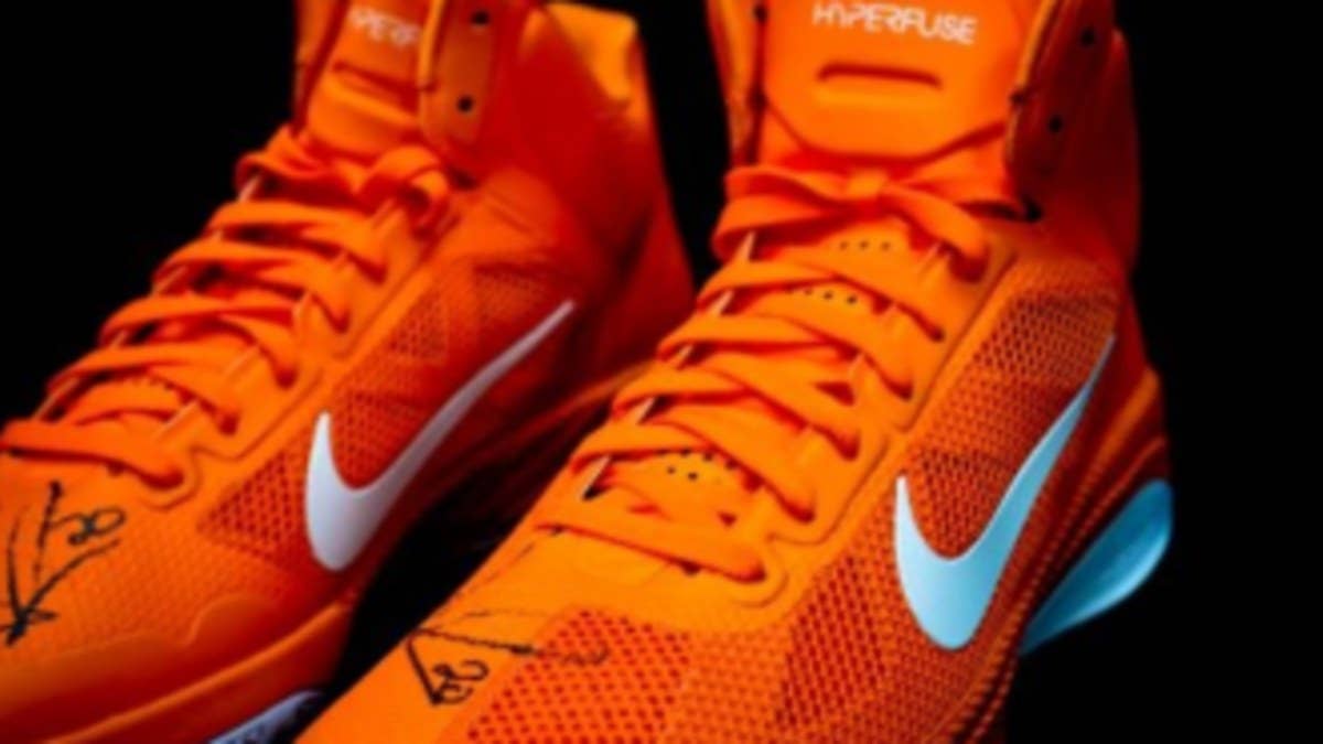 Greene salutes his alma mater by giving his bracket challenge winner a signed pair of the Orange/White Hyperfuse.