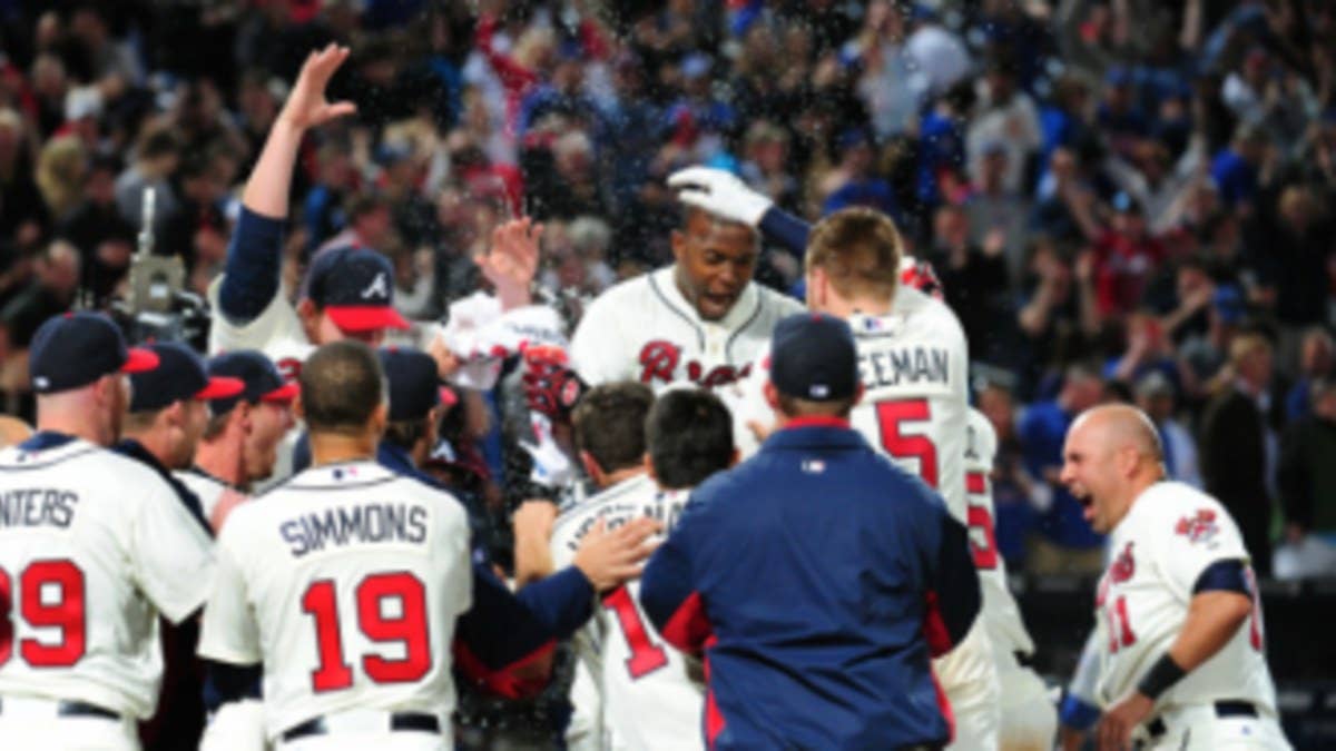 B.J. and Justin Upton each homer in the 9th inning to complete a dramatic Braves comeback victory.