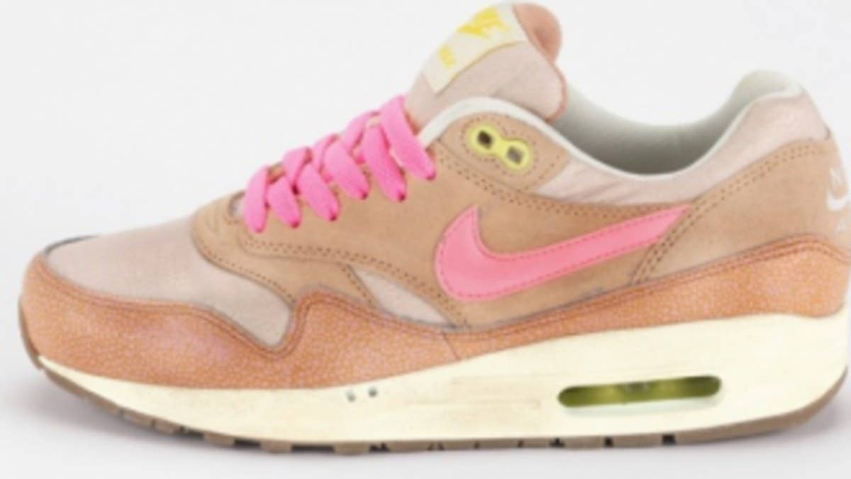 Another great look for the ladies arrives in the form of this metallic pink accented Air Max 1 by Nike Sportswear.  