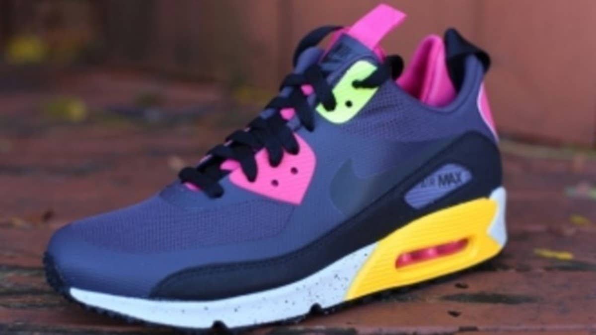 The recently introduced Air Max 90 Sneakerboot by Nike is released in an eyecatching 'Pink Foil' color scheme.