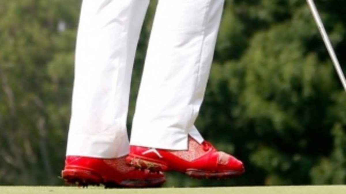 This past Sunday, golfer Keegan Bradley took cues from Tiger Woods, going with red attire for the final round at Bridgestone.