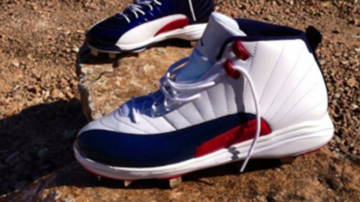 Jimmy Rollins shows off his likely footwear options for the upcoming World Baseball Classic.