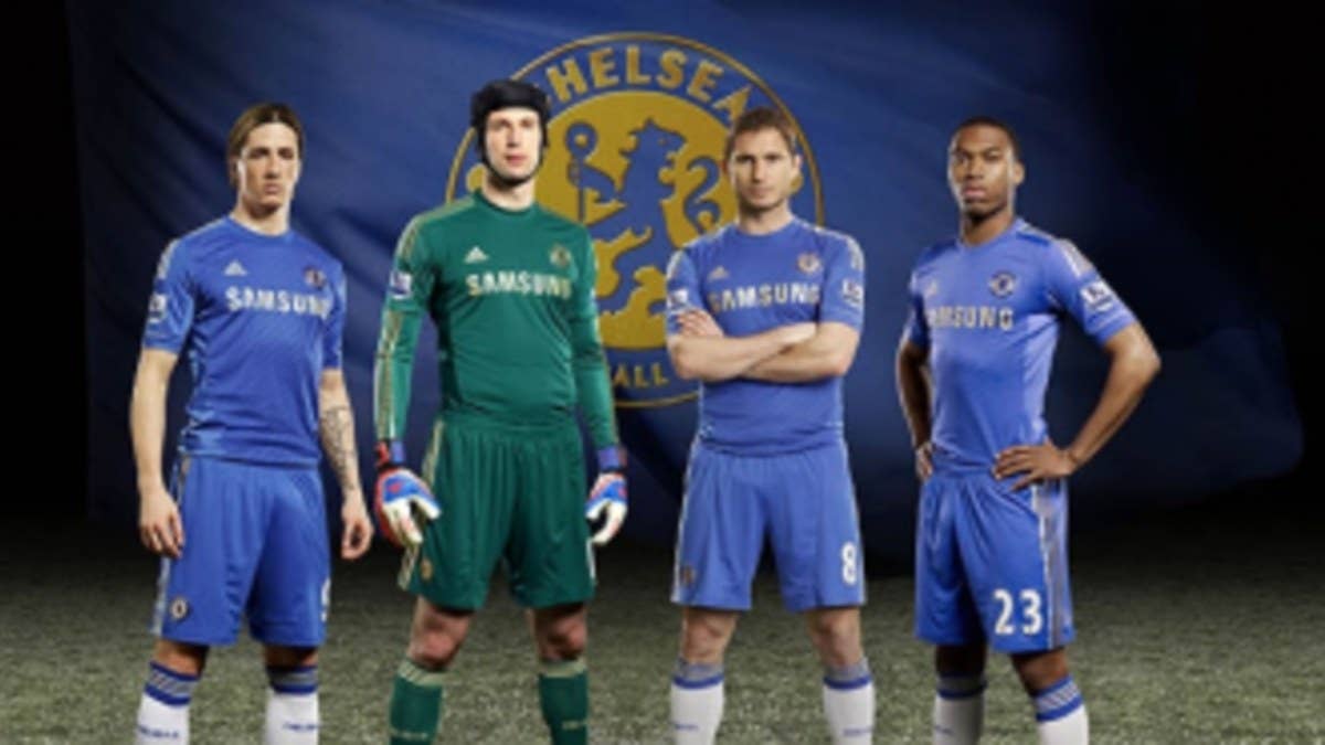 The new Chelsea home kit features the adidas, Samsung and club crest in gold.