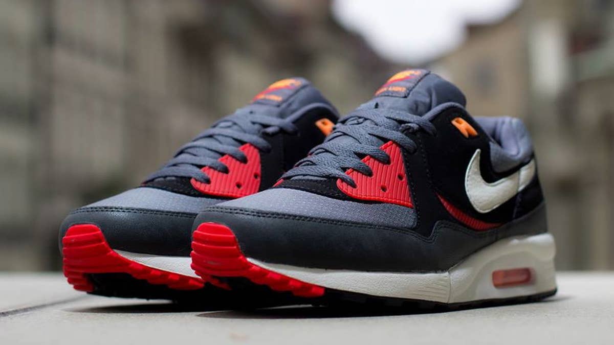 The retro Nike Air Max Light joins the 'Essential' rotation with a new Black / Sail / Black Pine colorway.