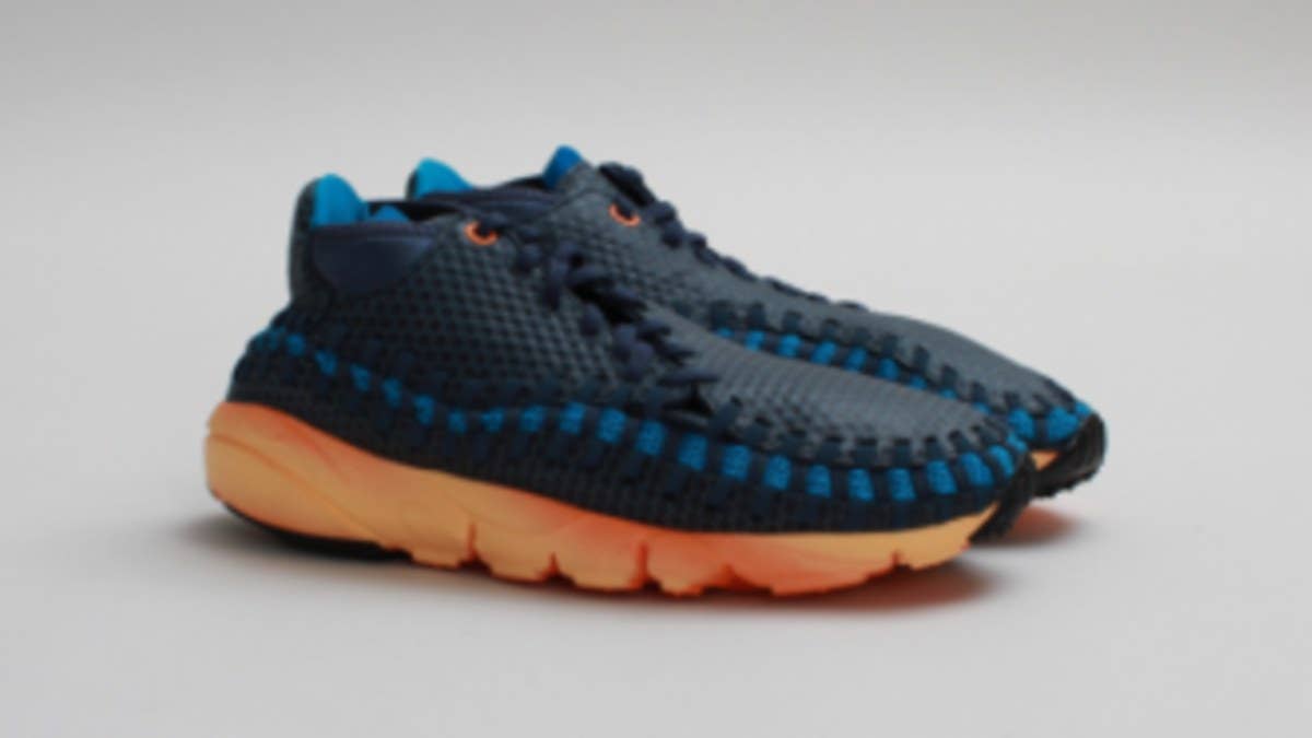 Nike Sportswear presents the Air Footscape Woven Chukka in Squadron Blue / Neon Turquoise.