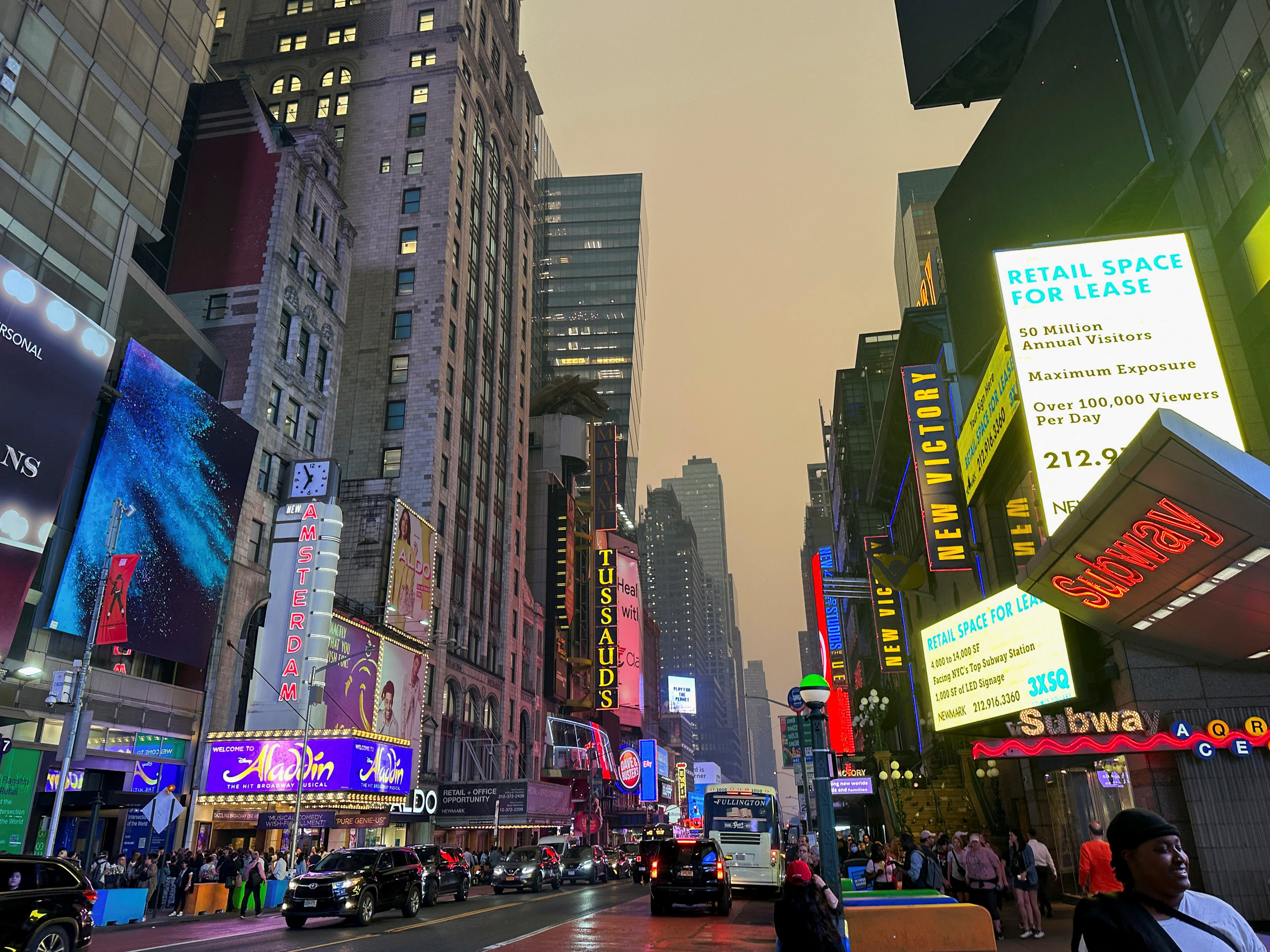 Times Square in Manhattan is shrouded in haze and smoke
