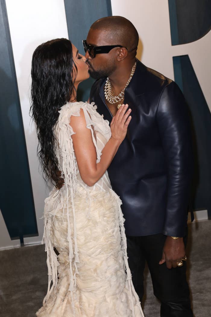Kim and Ye kissing