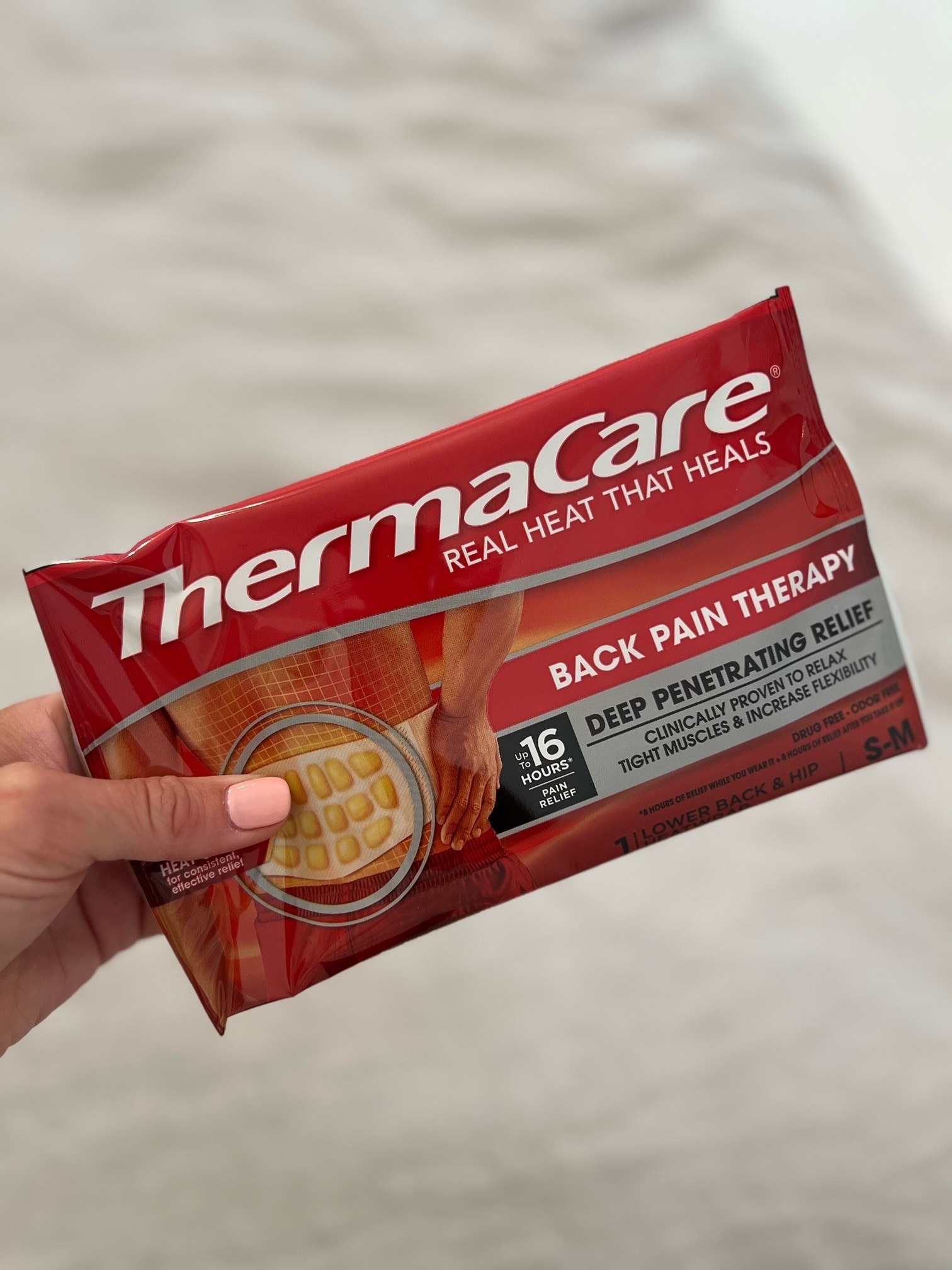 A package of Thermacare heat wraps.