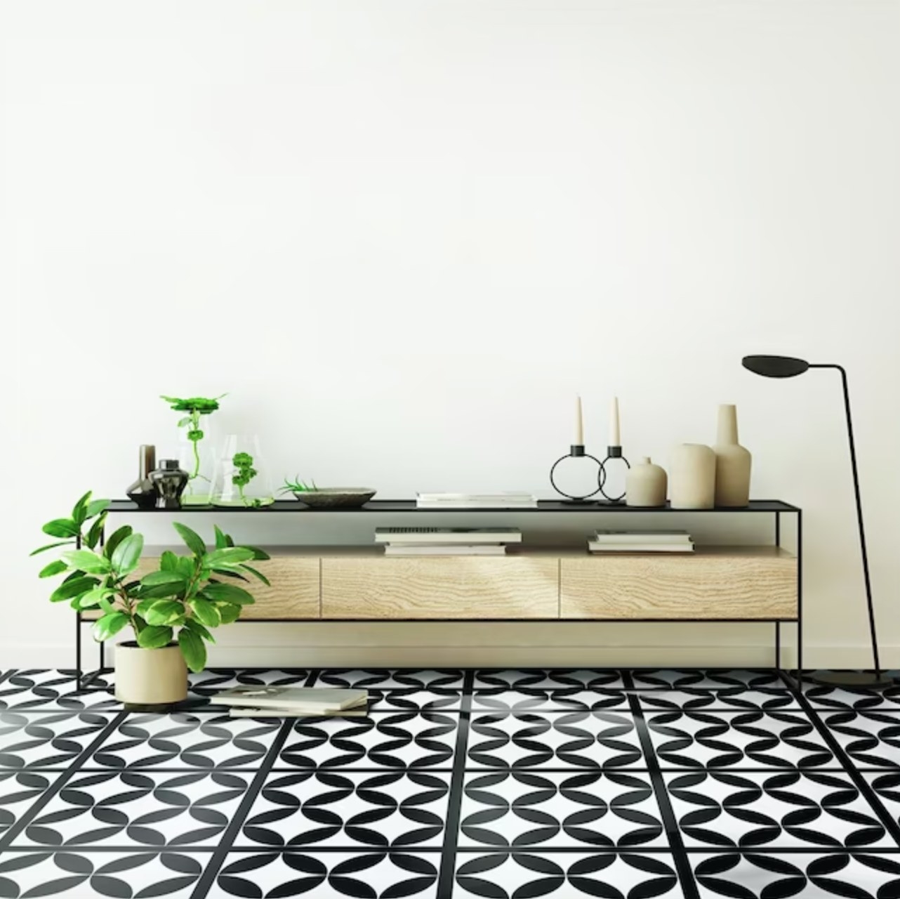 the black and white tiles in a decorated entryway