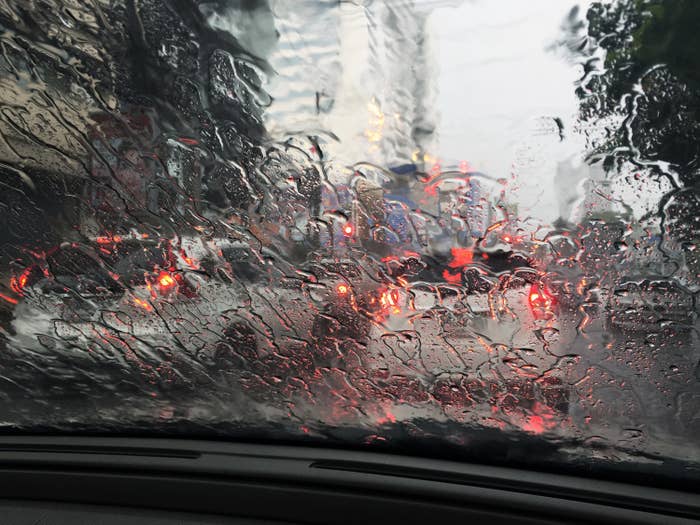 A scene through a rainy windshield