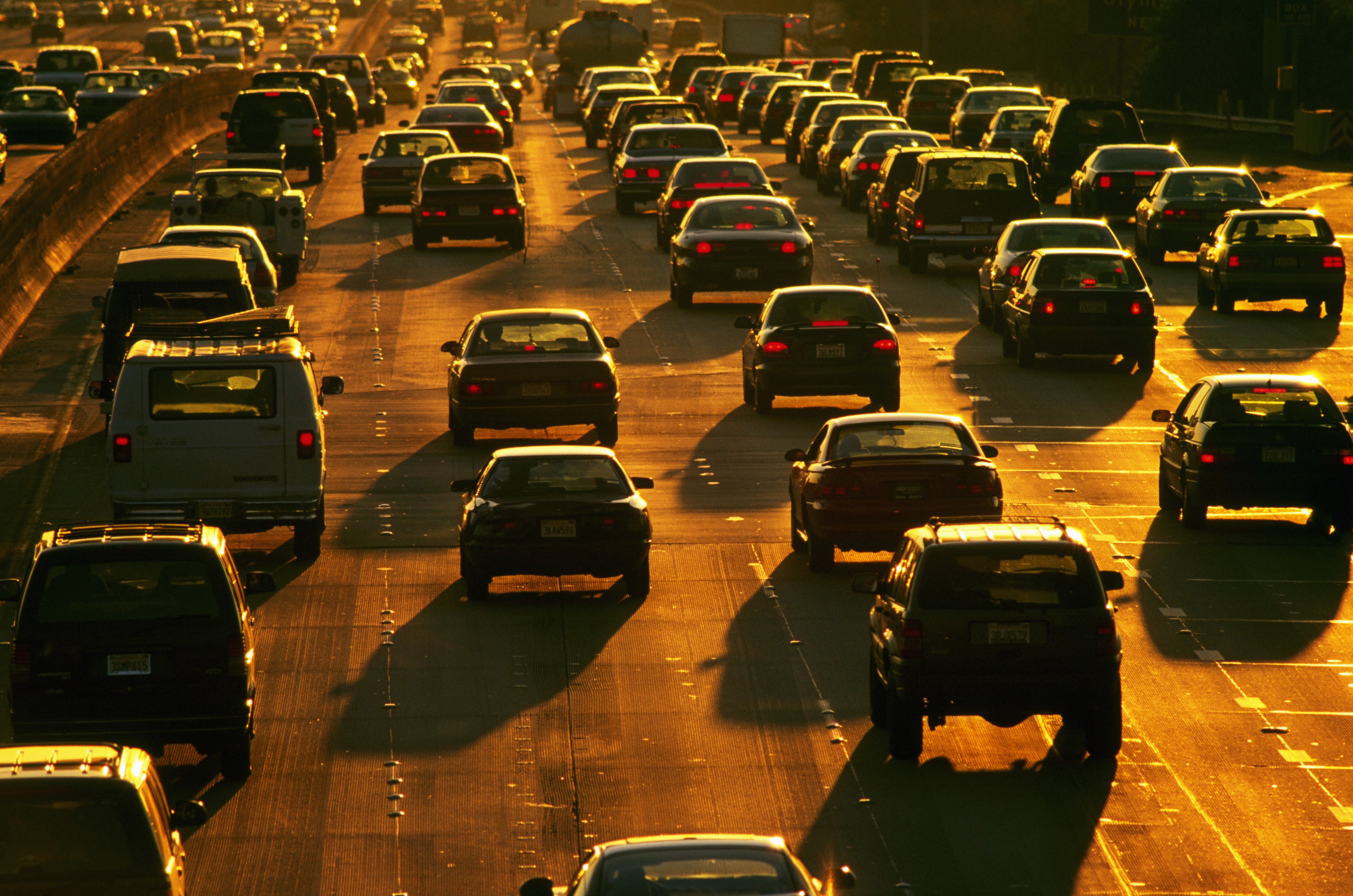 California freeway traffic at sunset