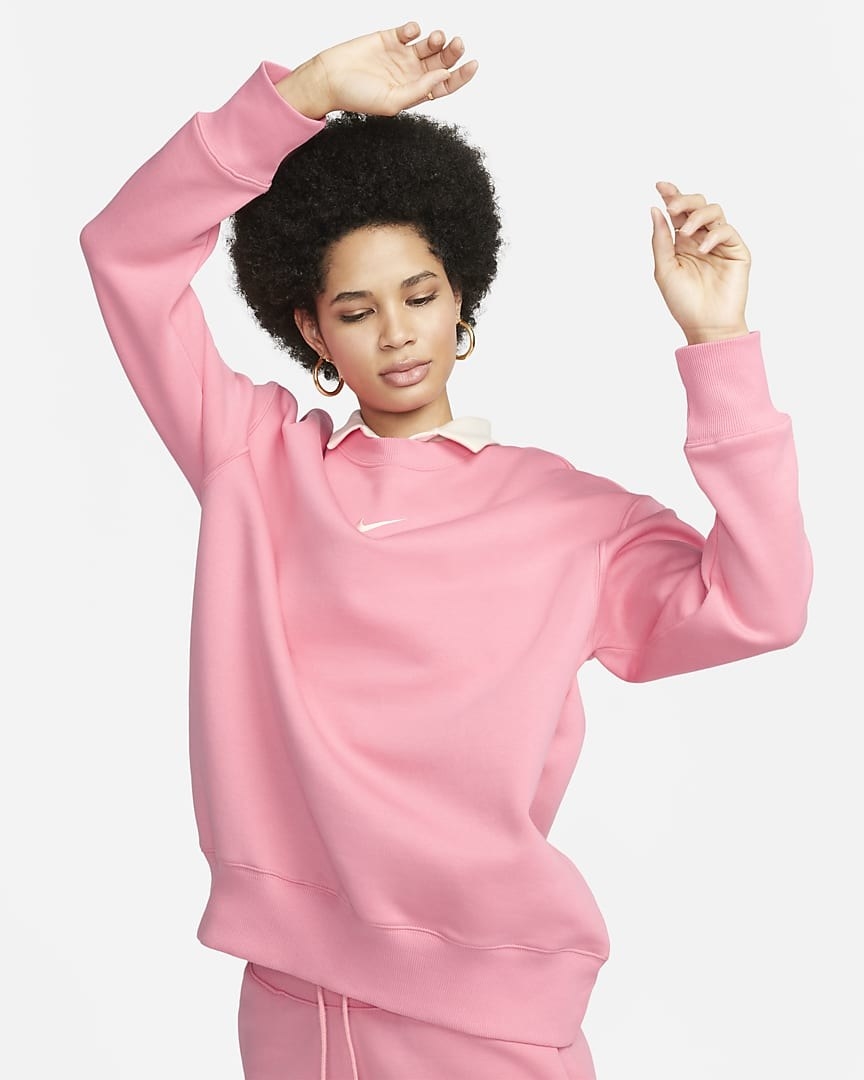 Image of model wearing pink sweatshirt