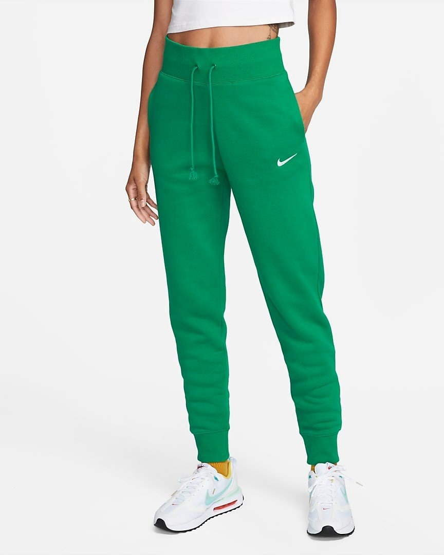 Image of model wearing green sweatpants