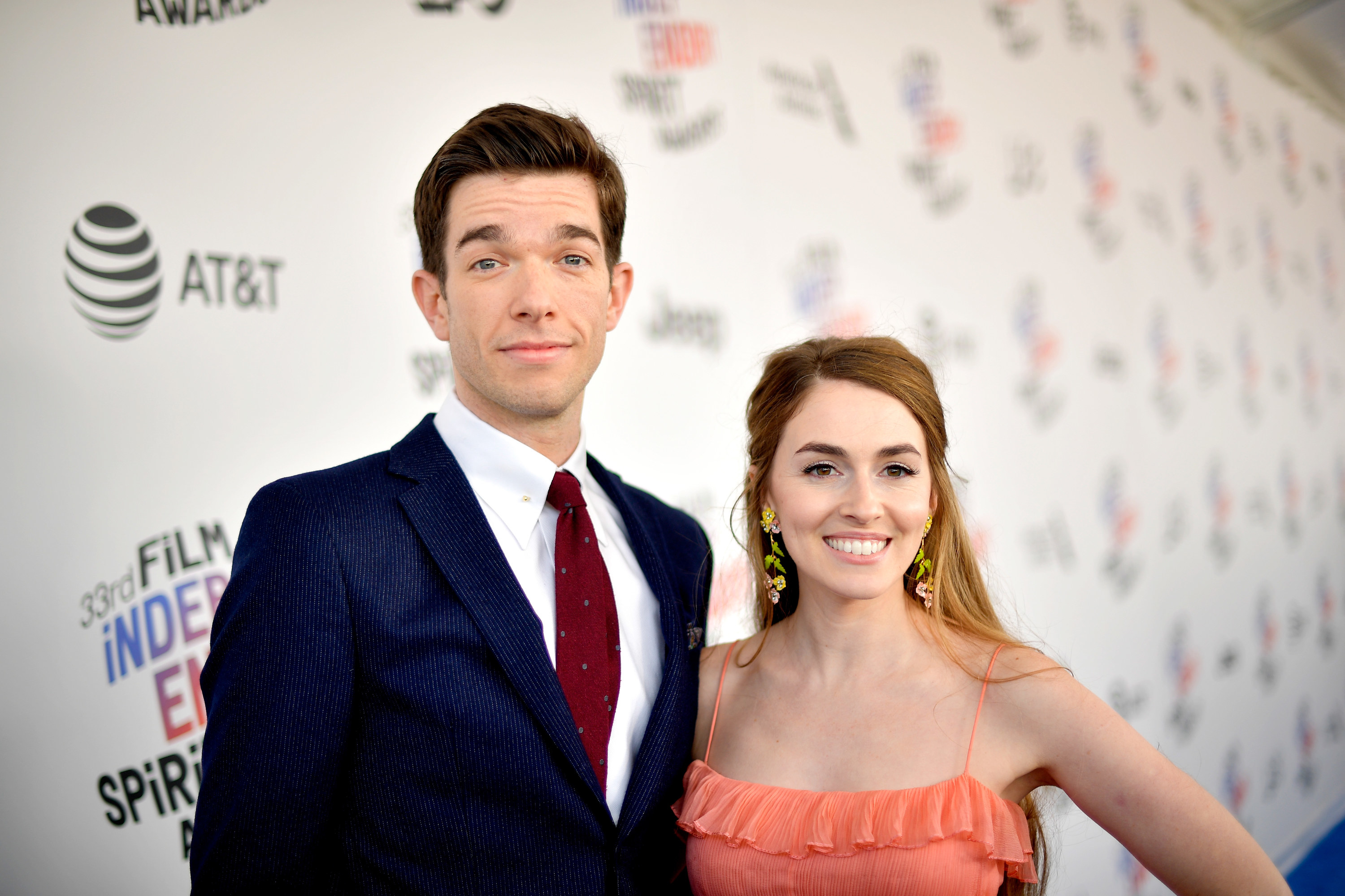 Close-up of John and Anna at a media event