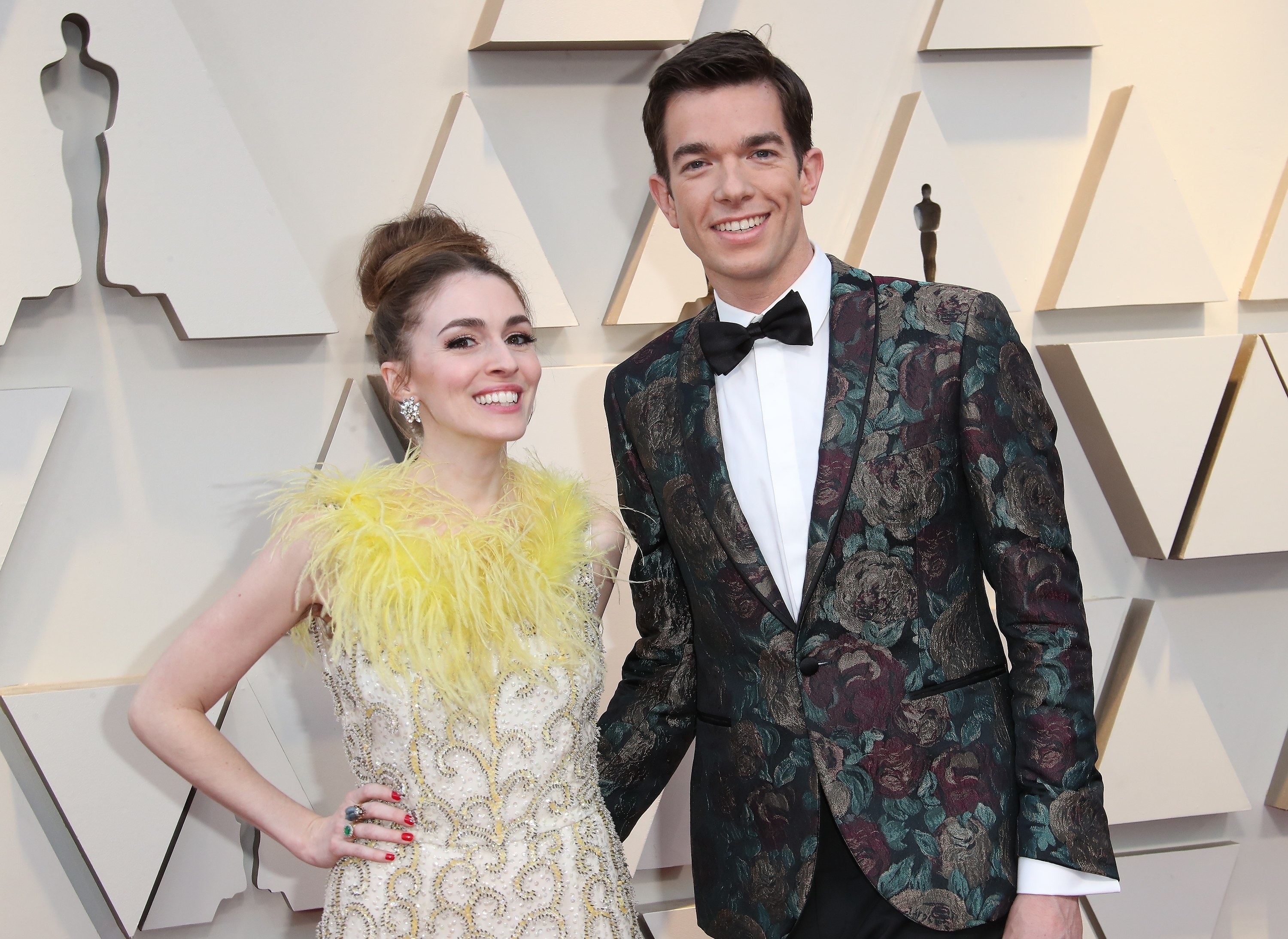 Close-up of John and Anna at a media event