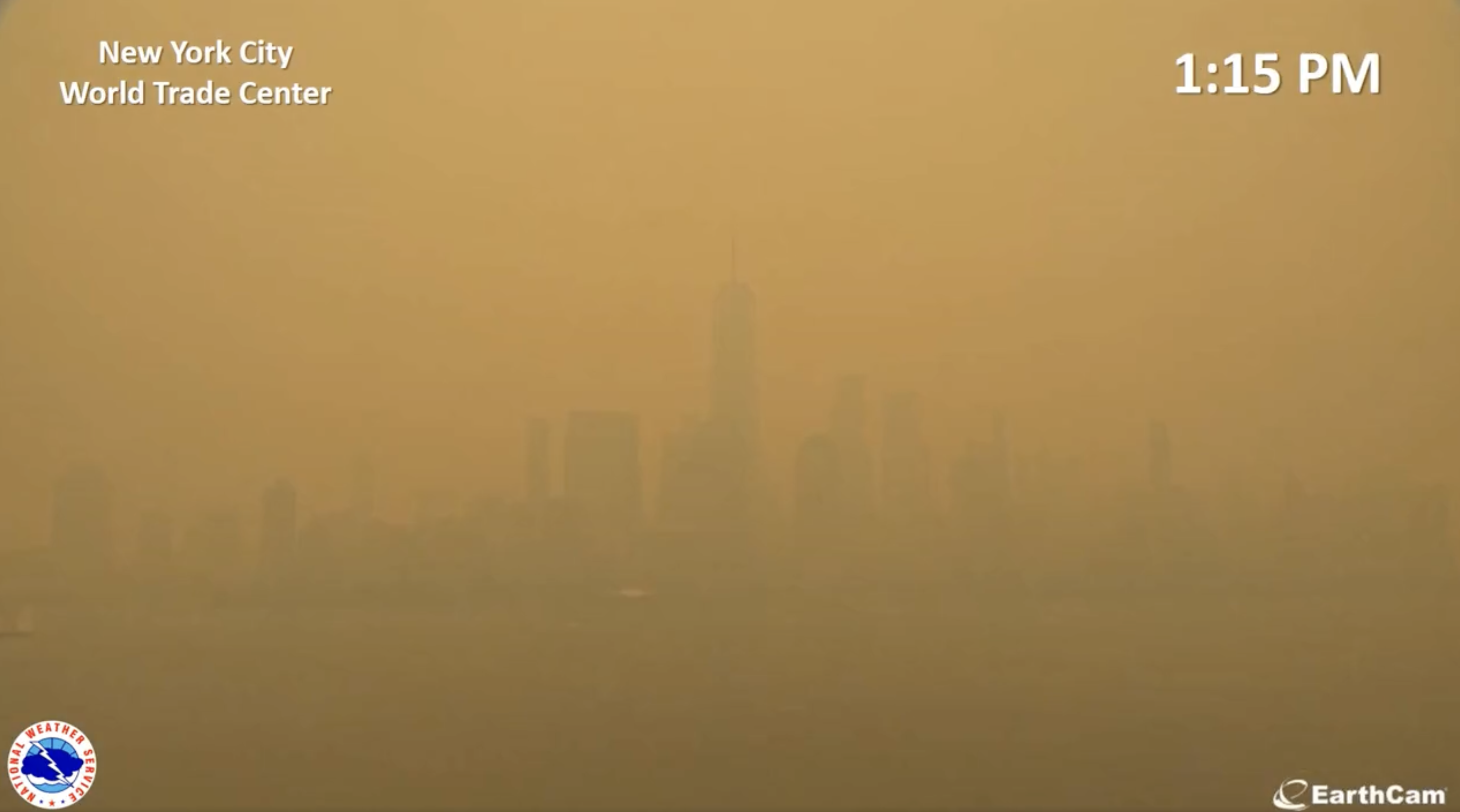 View of the downtown Manhattan skyline at 1:15 pm, with the skyline barely visible