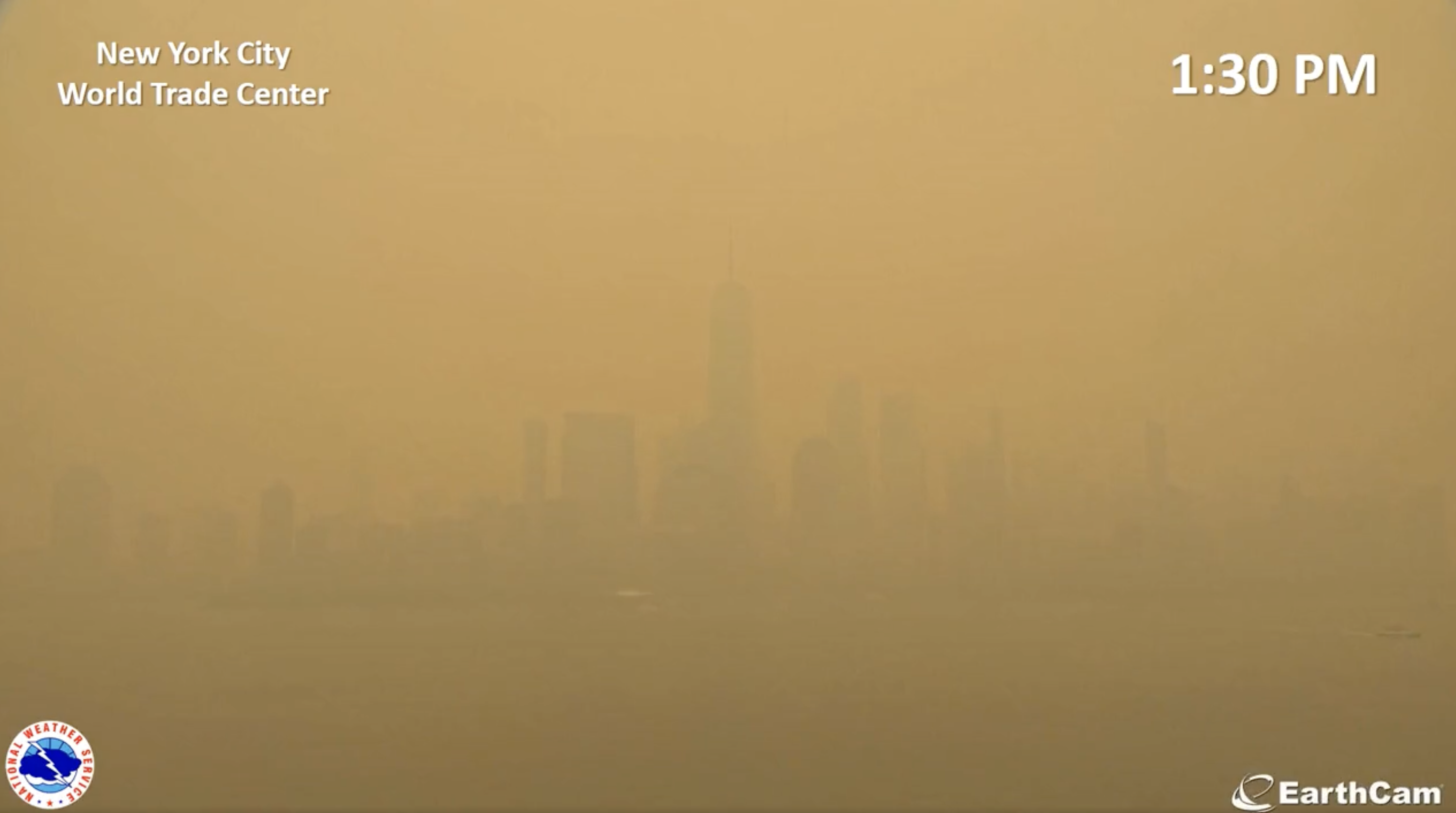 View of the downtown Manhattan skyline at 1:30 pm, with the skyline barely visible