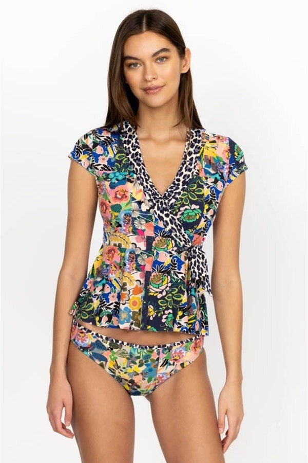 model in cap sleeve peplum tankini top and matching bottoms in multicolor floral and leopard patchwork print