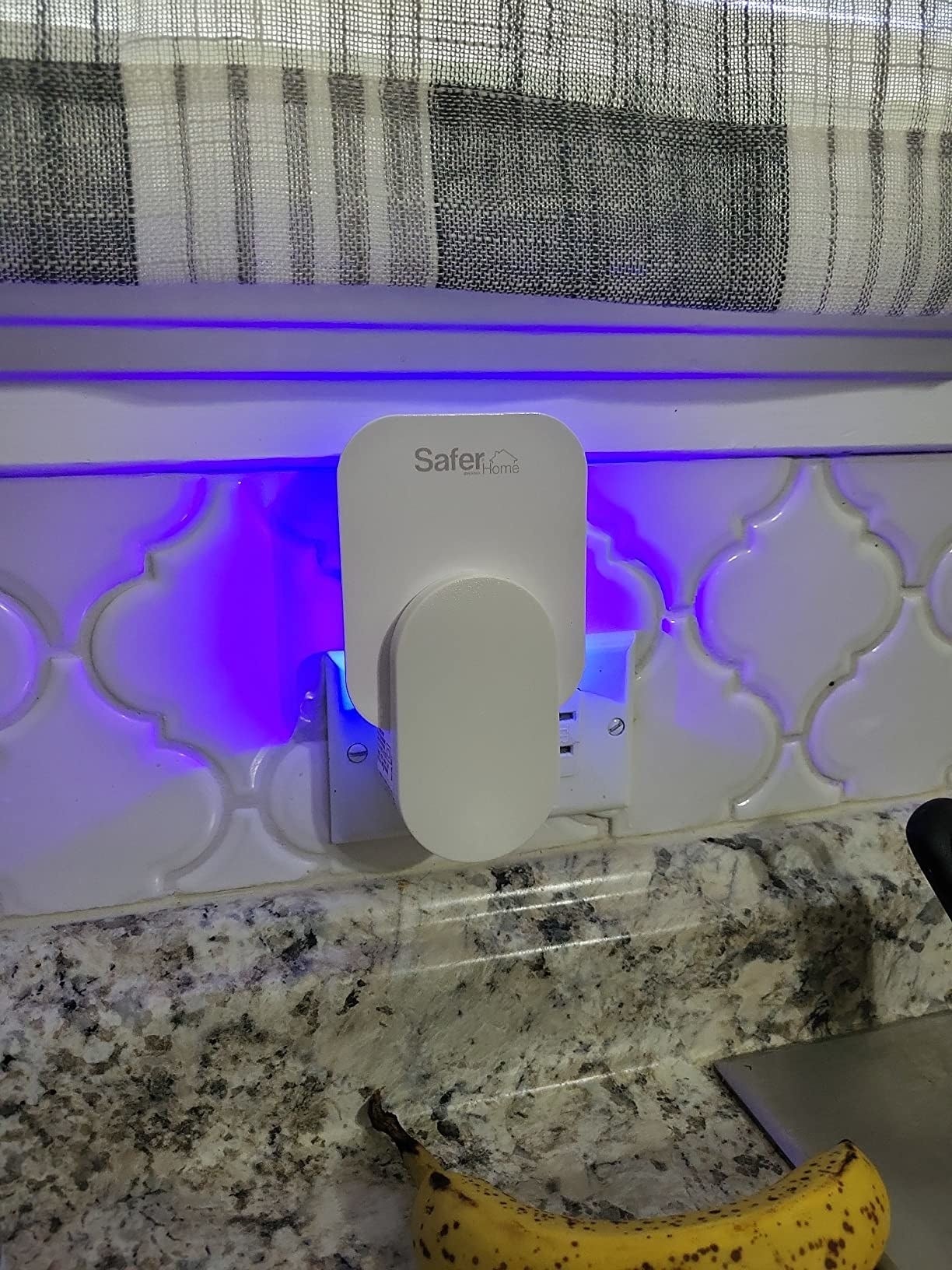 The trap plugged into the reviewer's outlet with the bluish  airy  on