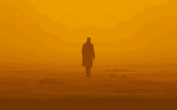 gif from Blade Runner of a man walking through orange and dusty terrain