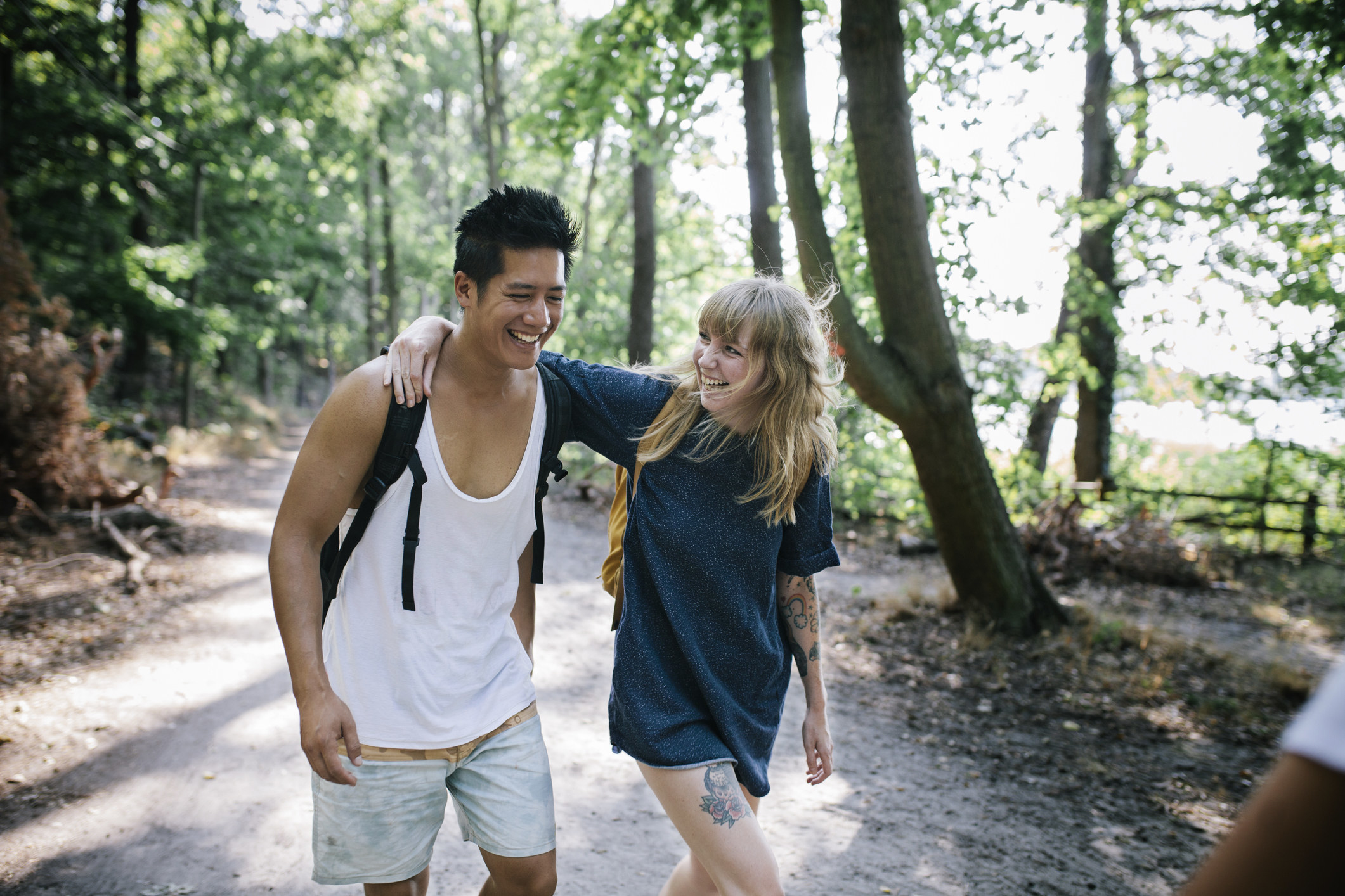 Young couple walking together in a park