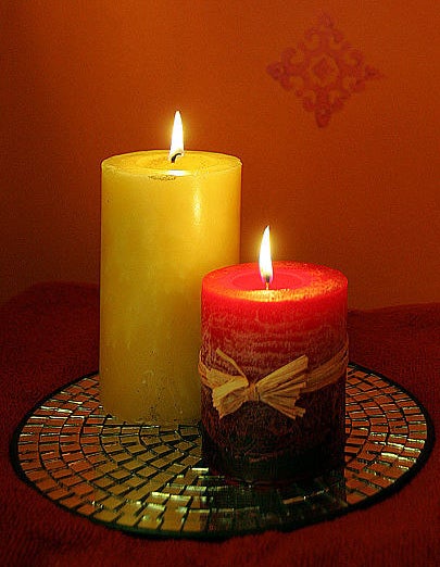 two lit pillar candles