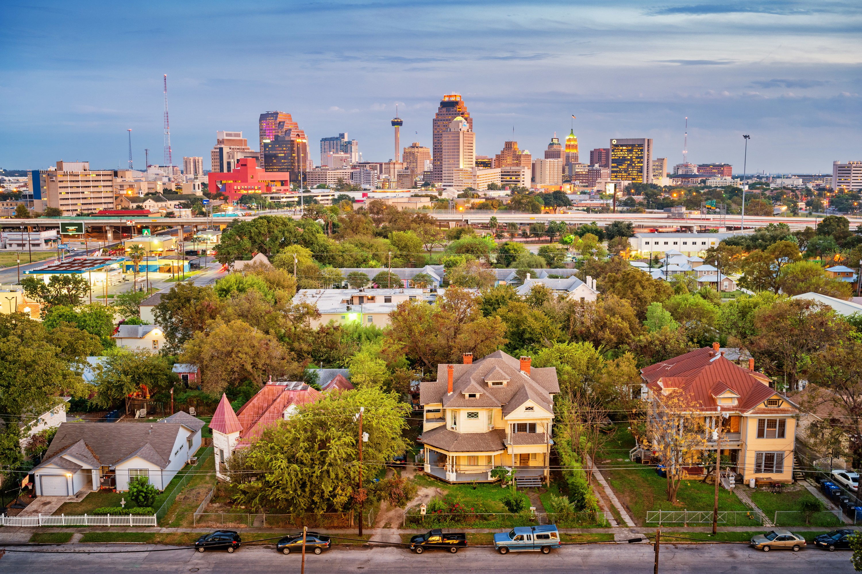 Stock photograph of a residential district and the downtown skyline of San Antonio Texas USA at twilight