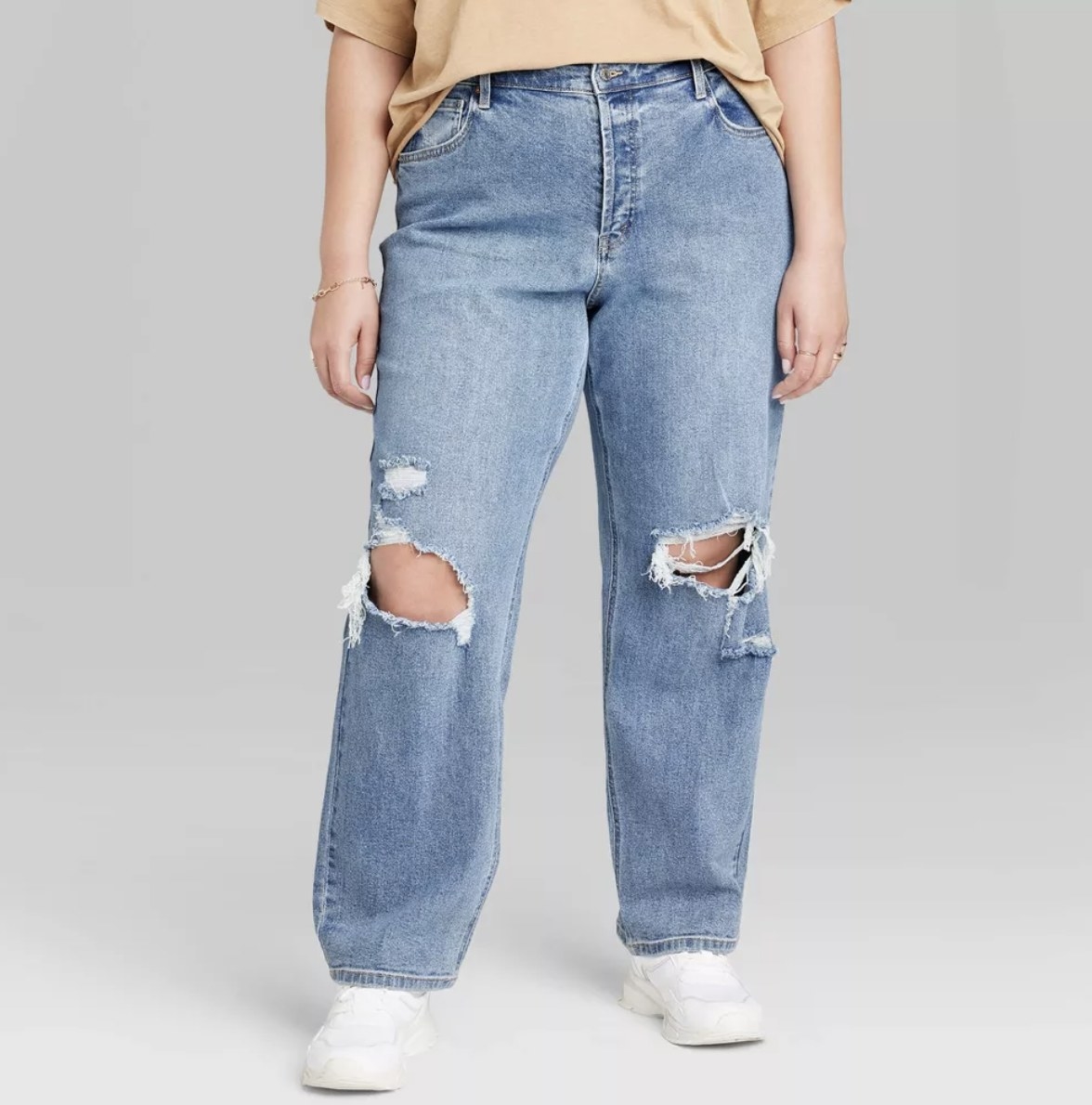 A pair of distressed jeans