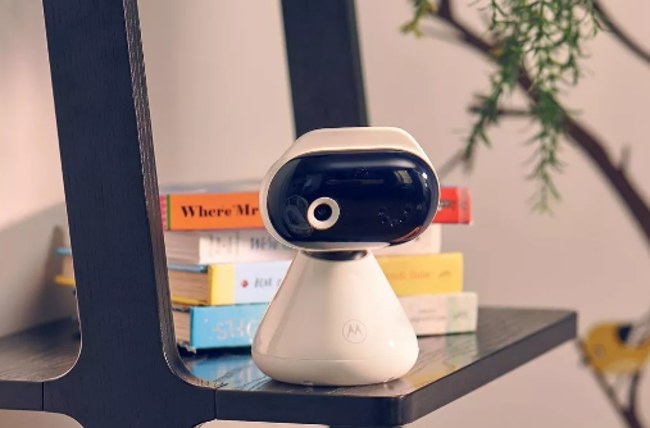 The white baby monitor on a table
