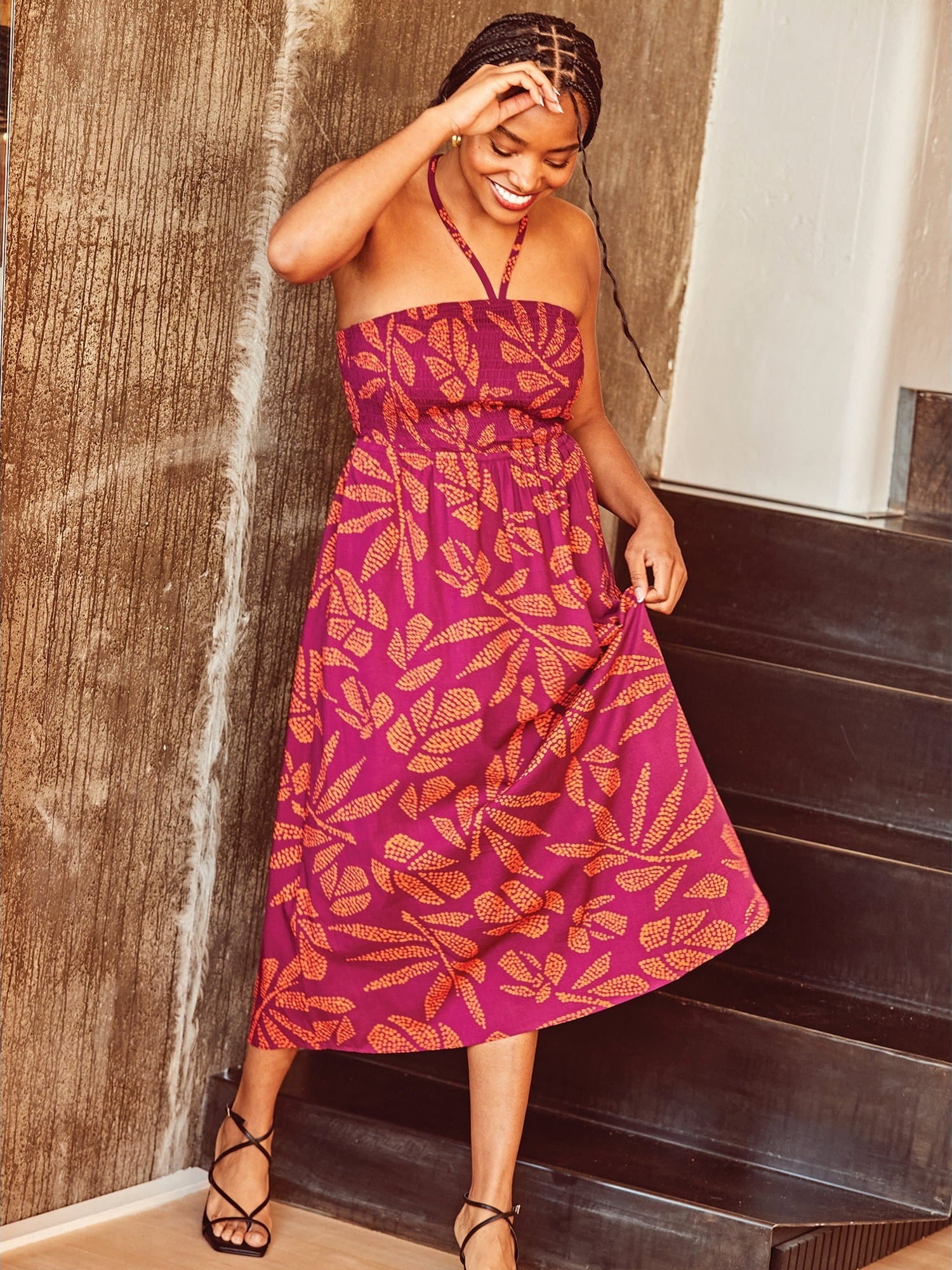 A model in the botanical print dress