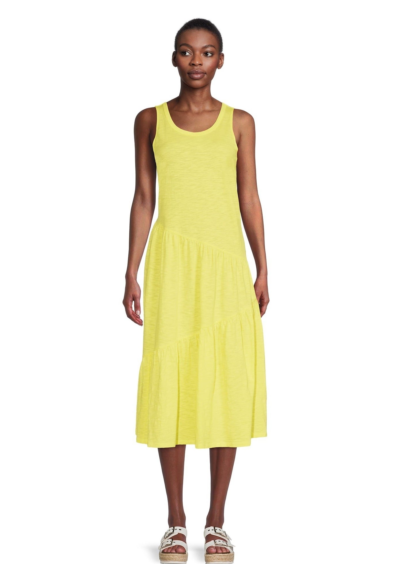 A model in the bright yellow cotton dress