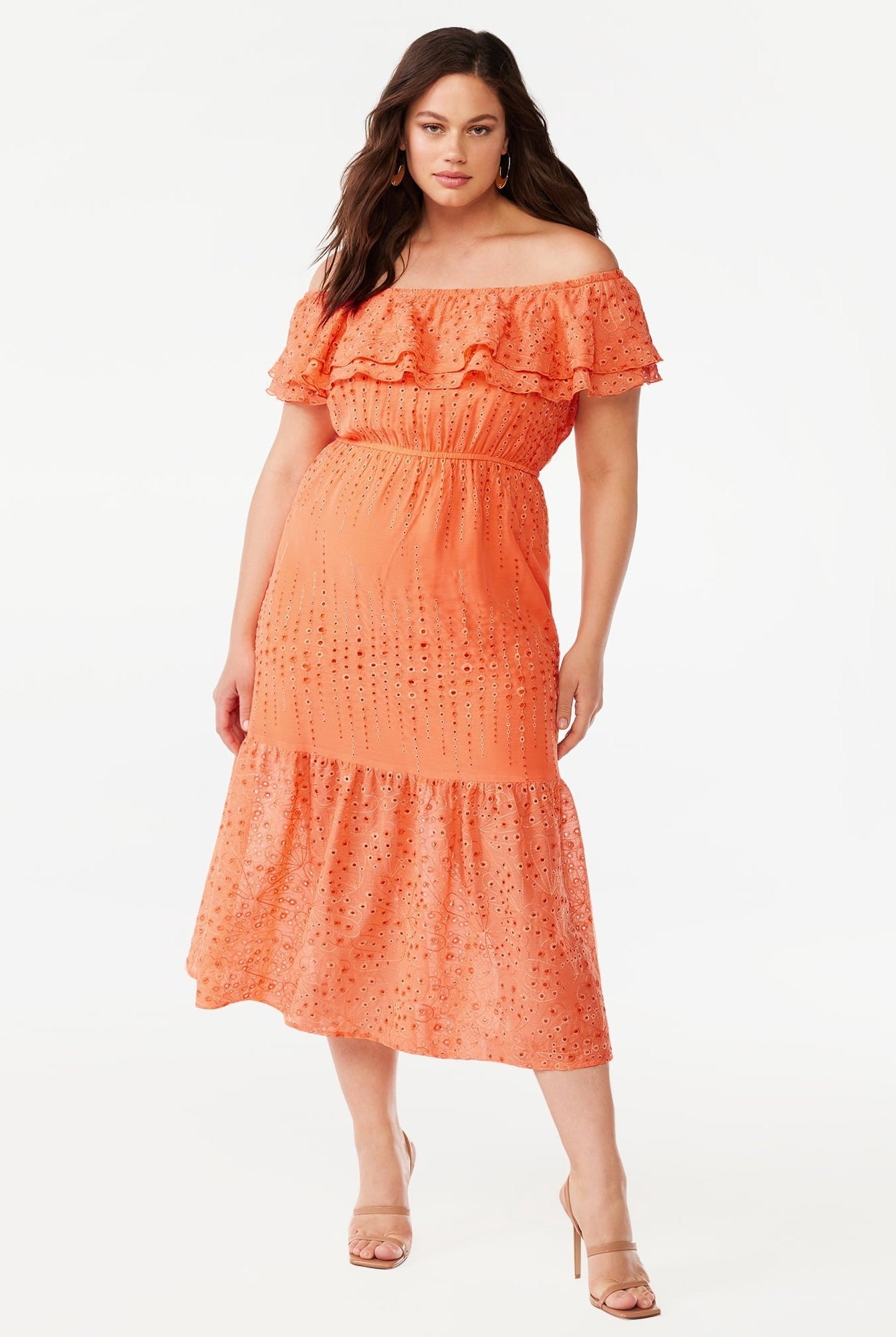 A model in the orange dress