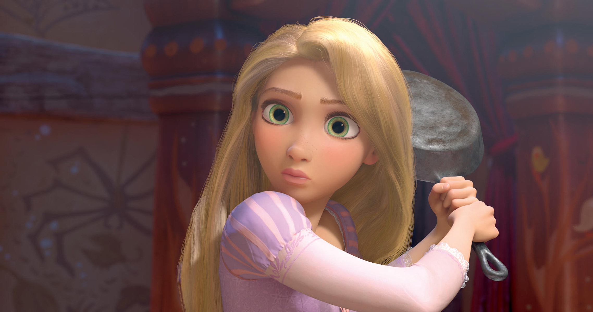 The animated Rapunzel holding a cast iron skillet about to hit someone