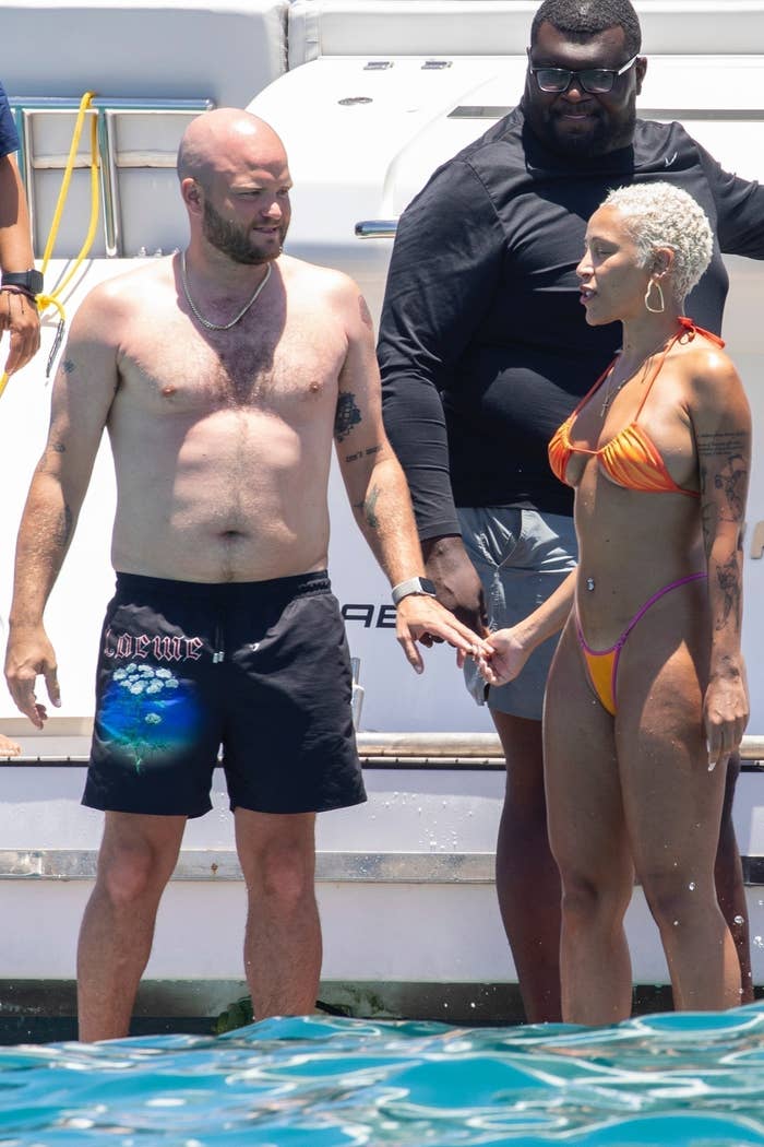 Doja Cat holding hands with J. Cyrus