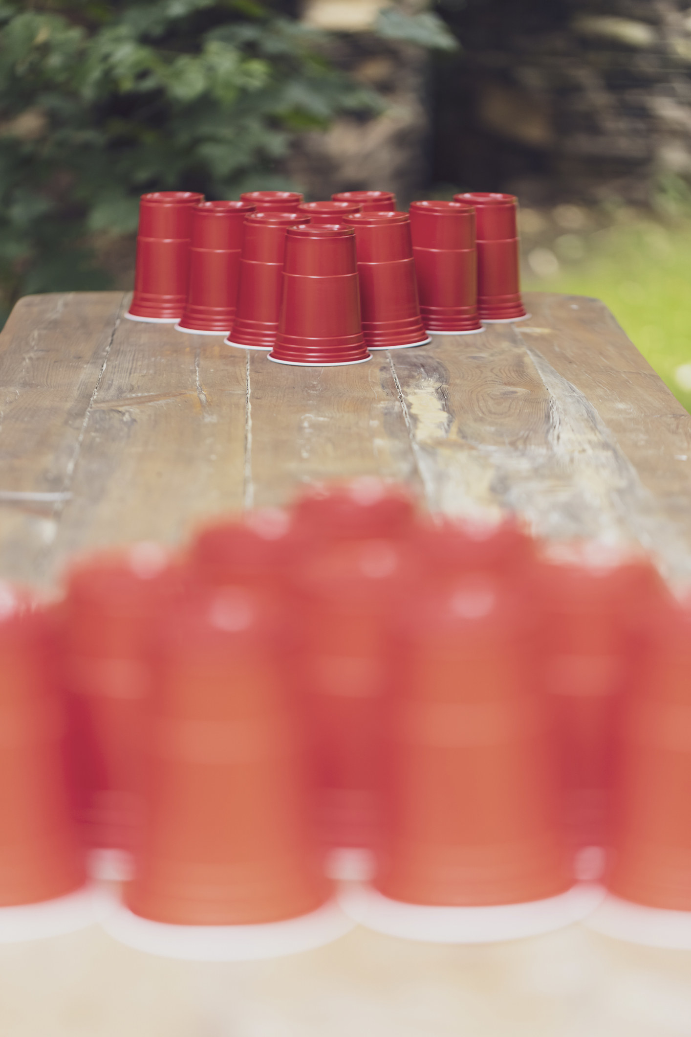 Beer pong table with red cups.