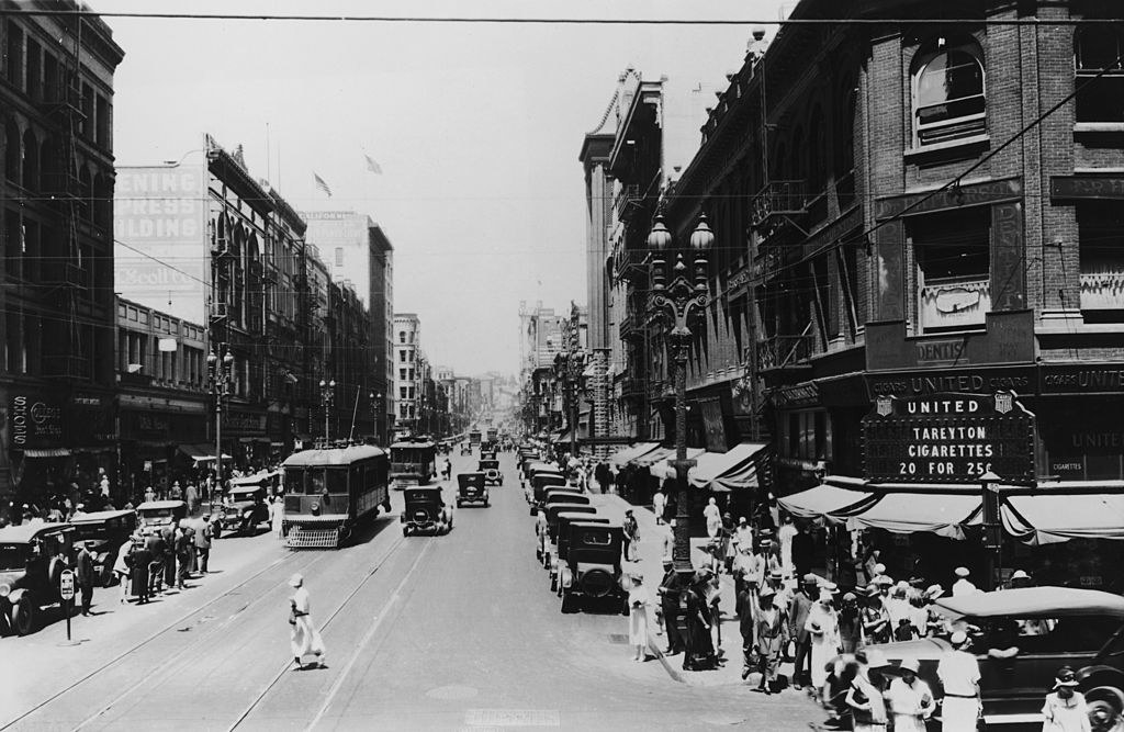 old black and white photograph of a busy street