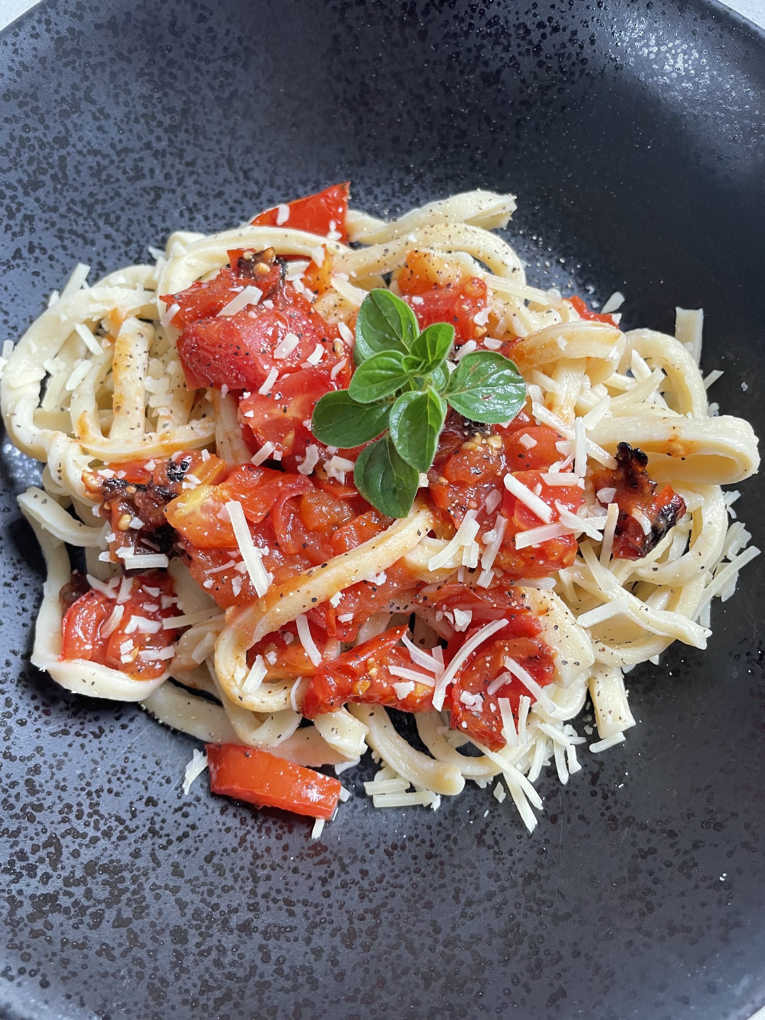 Pasta and tomatoes in a bowl