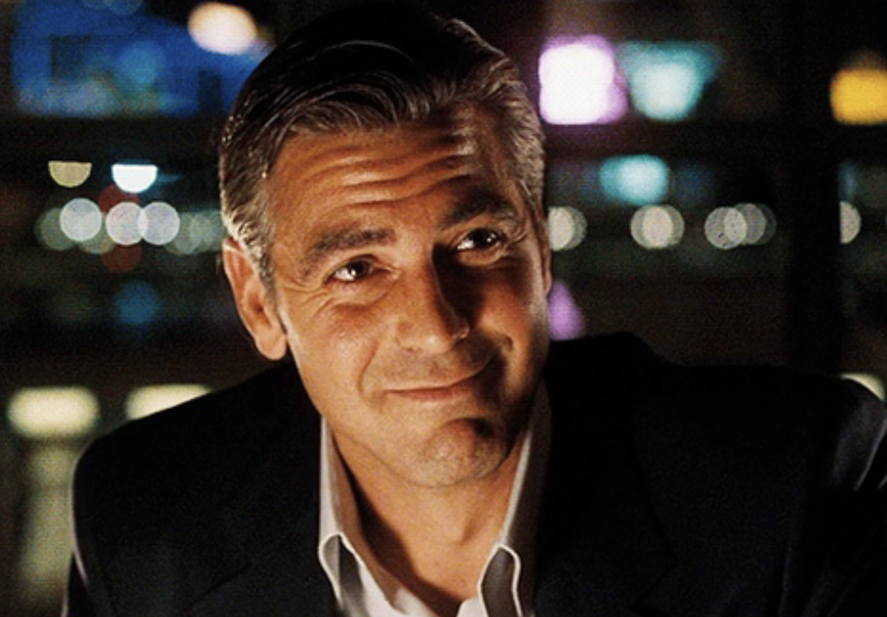 Close-up of George Clooney smirking in &quot;Ocean&#x27;s 11&quot;
