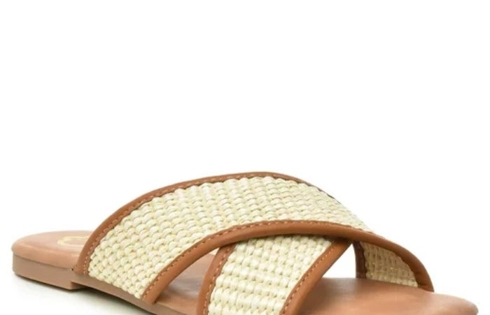 straw flat sandals with brown trim, crossover straps
