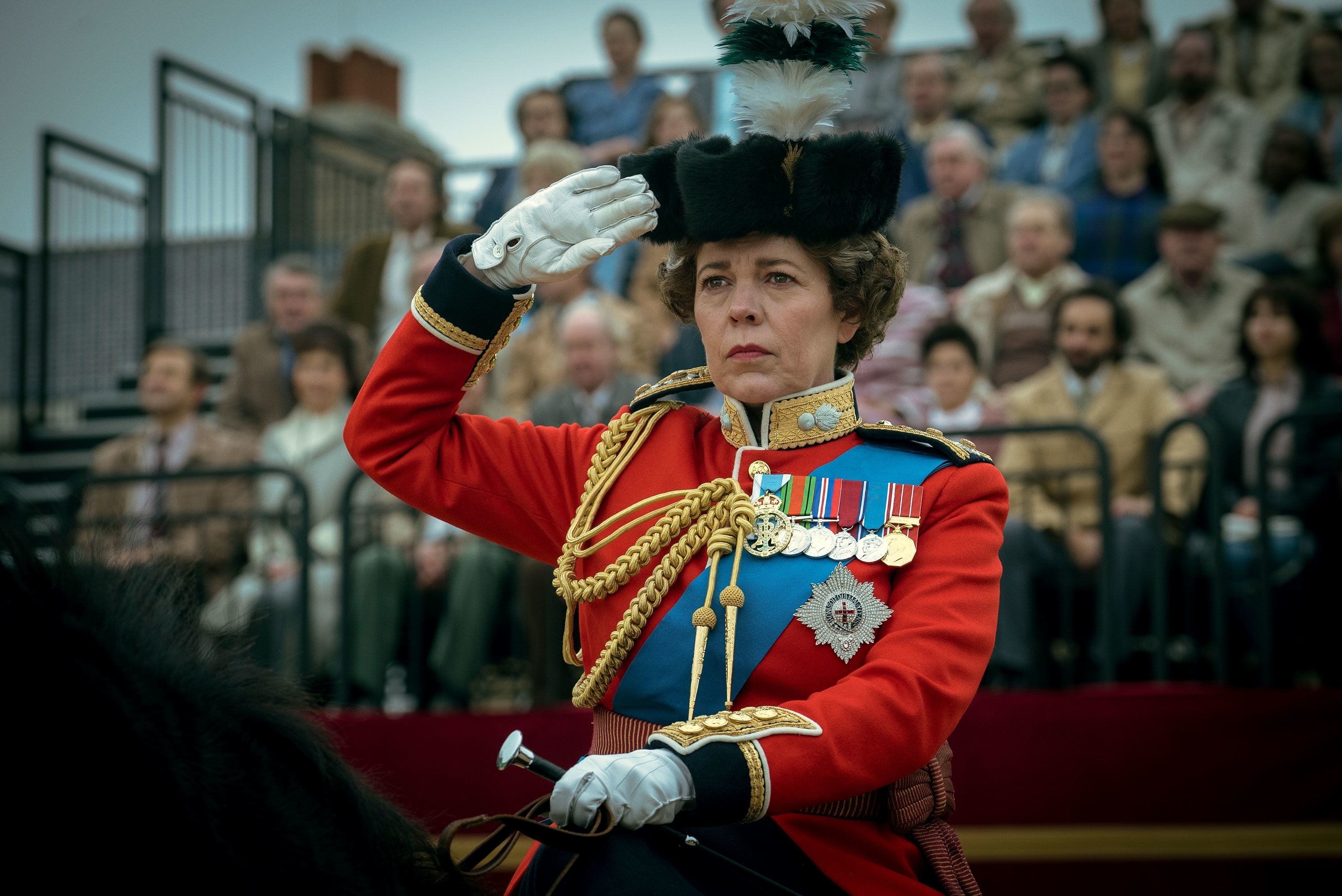 The Crown Queen Elizabeth saluting on horseback