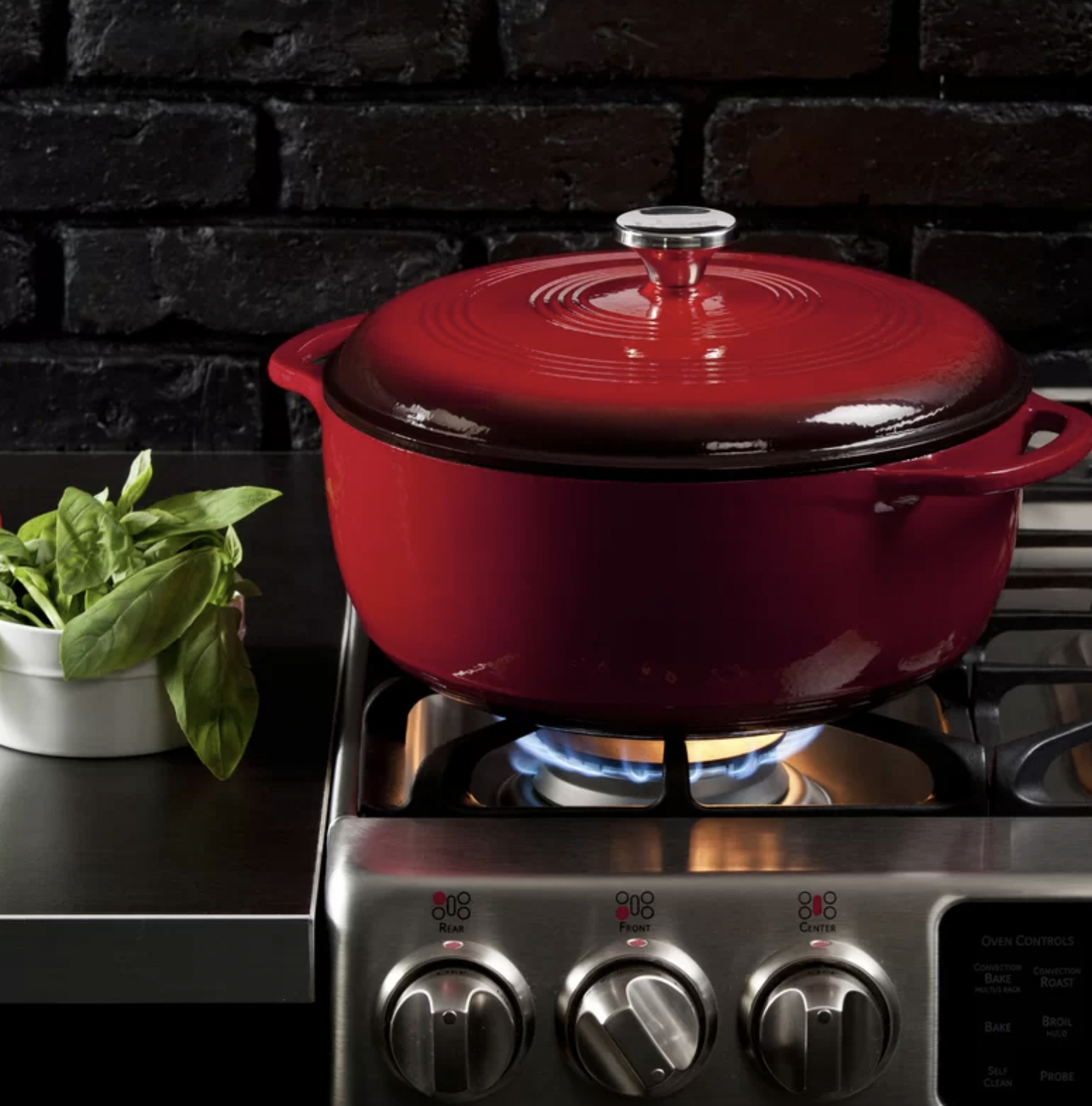 the red dutch oven on stovetop